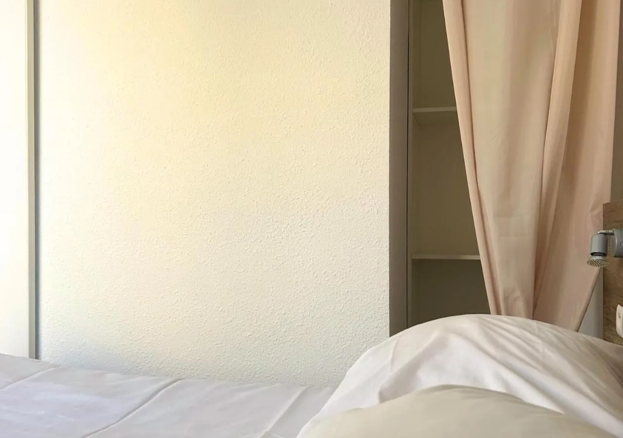 Bed in Hôtel Le Carnon