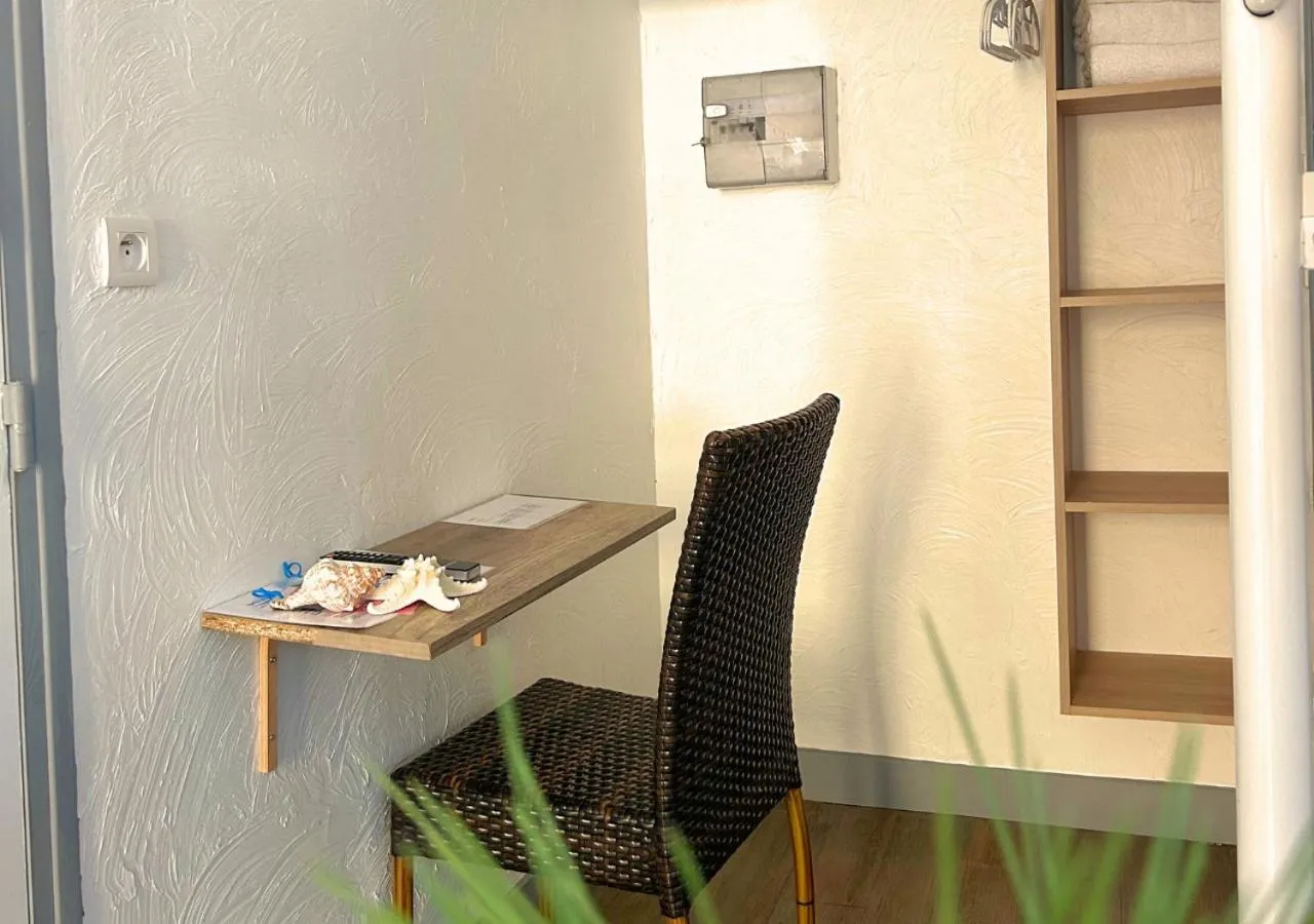 Bedroom in Hôtel Le Carnon