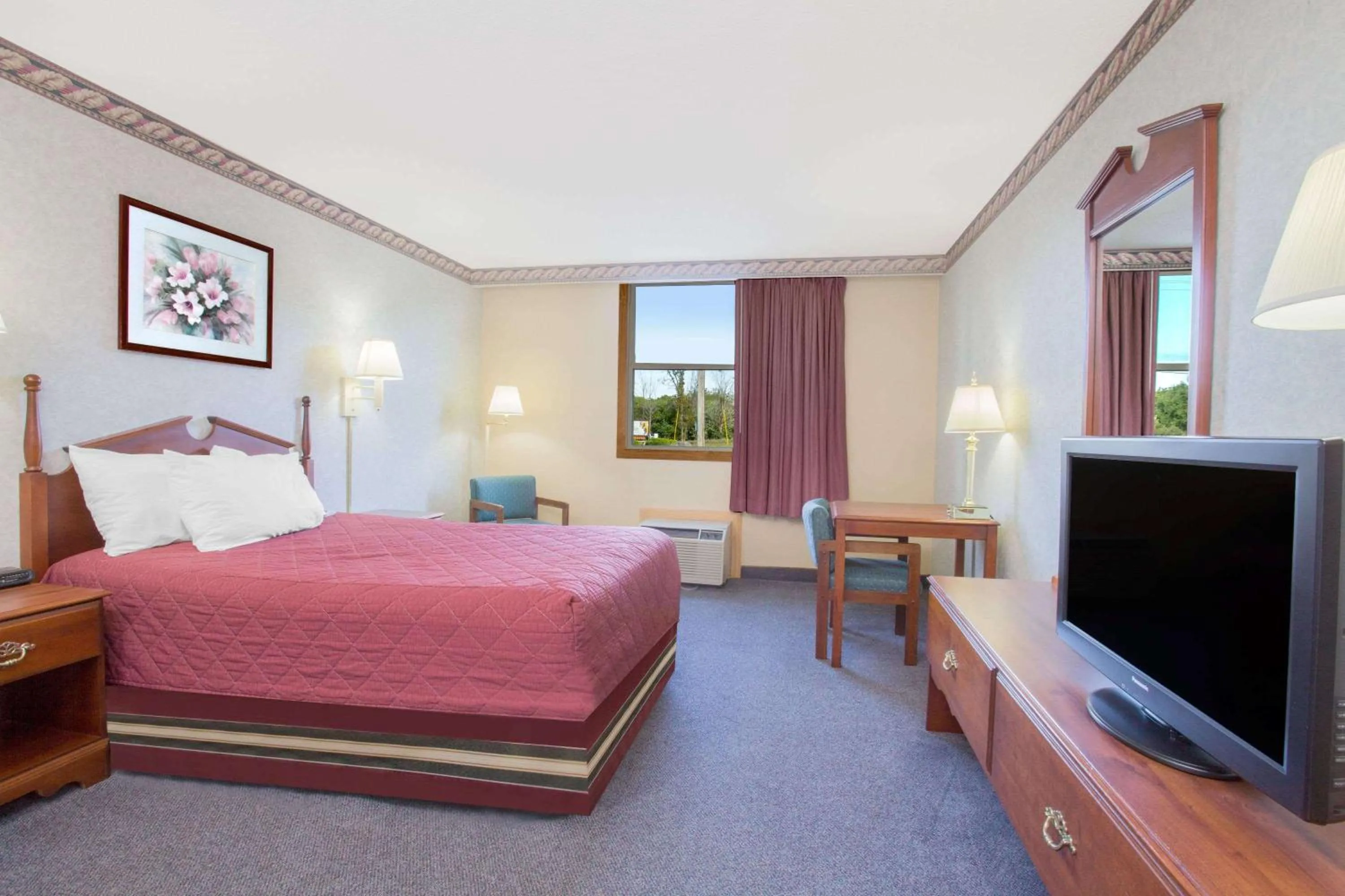 Photo of the whole room, Bed in Ramada by Wyndham Angola/Fremont Area