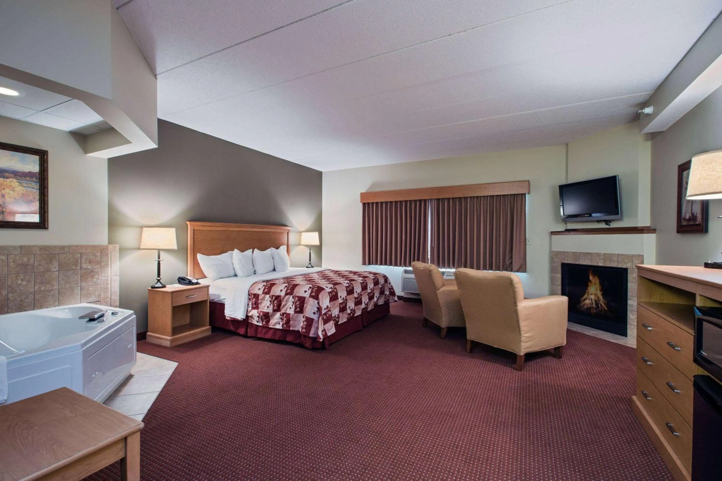 Bed in AmeriVu Inn and Suites - Waconia