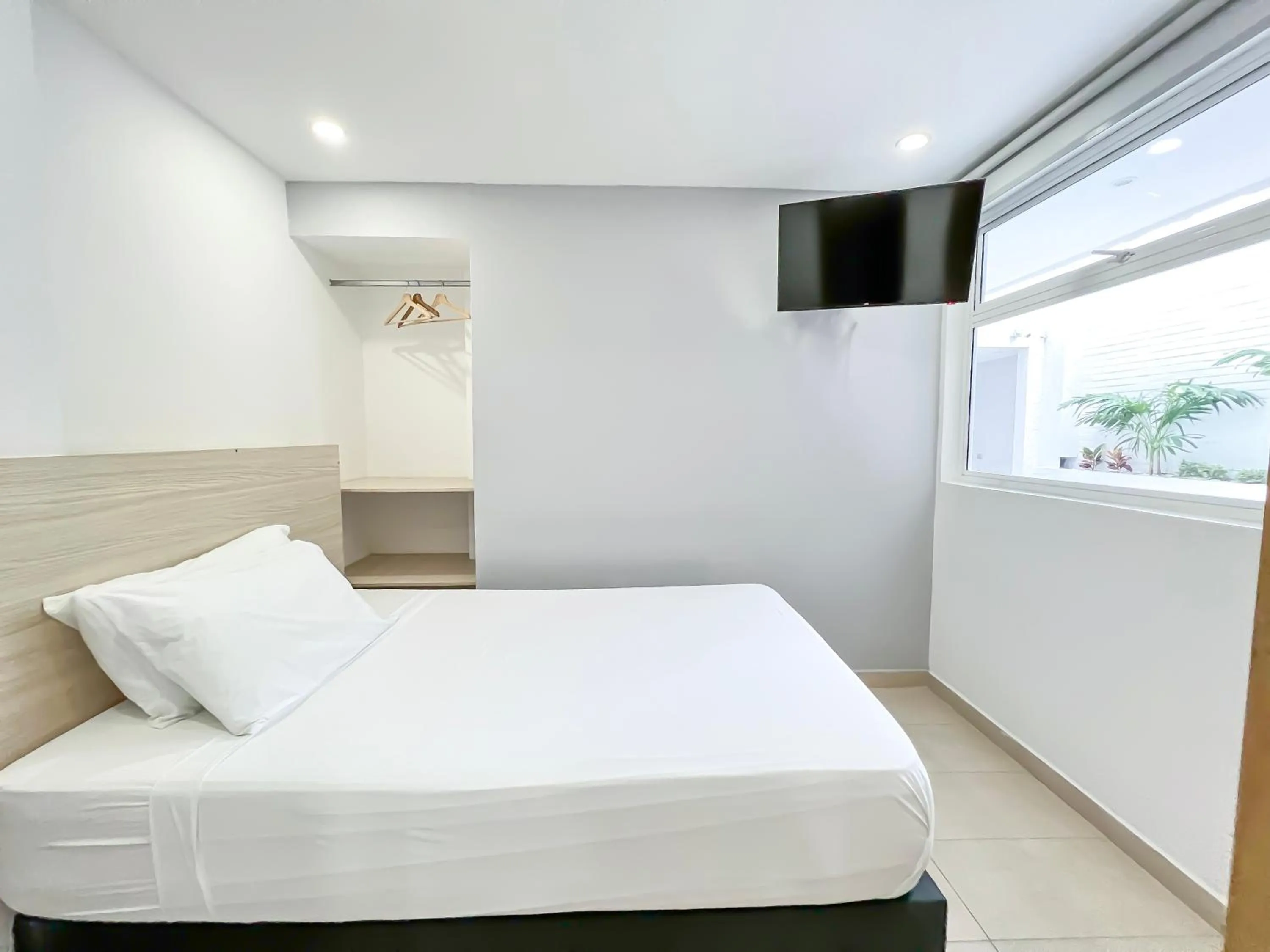 Bed in Stanza Hotel Monteria