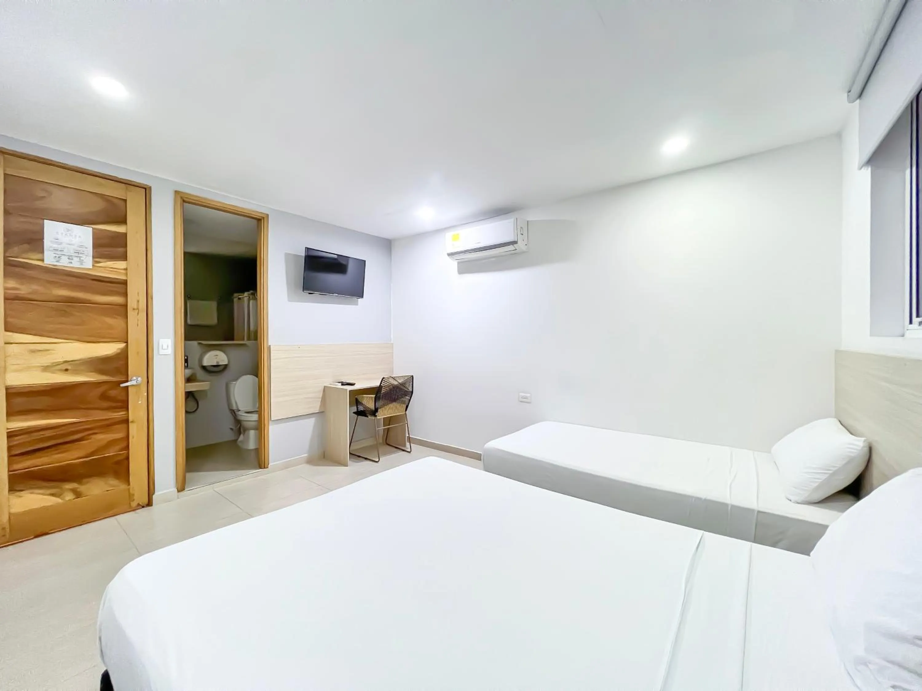 Bed in Stanza Hotel Monteria