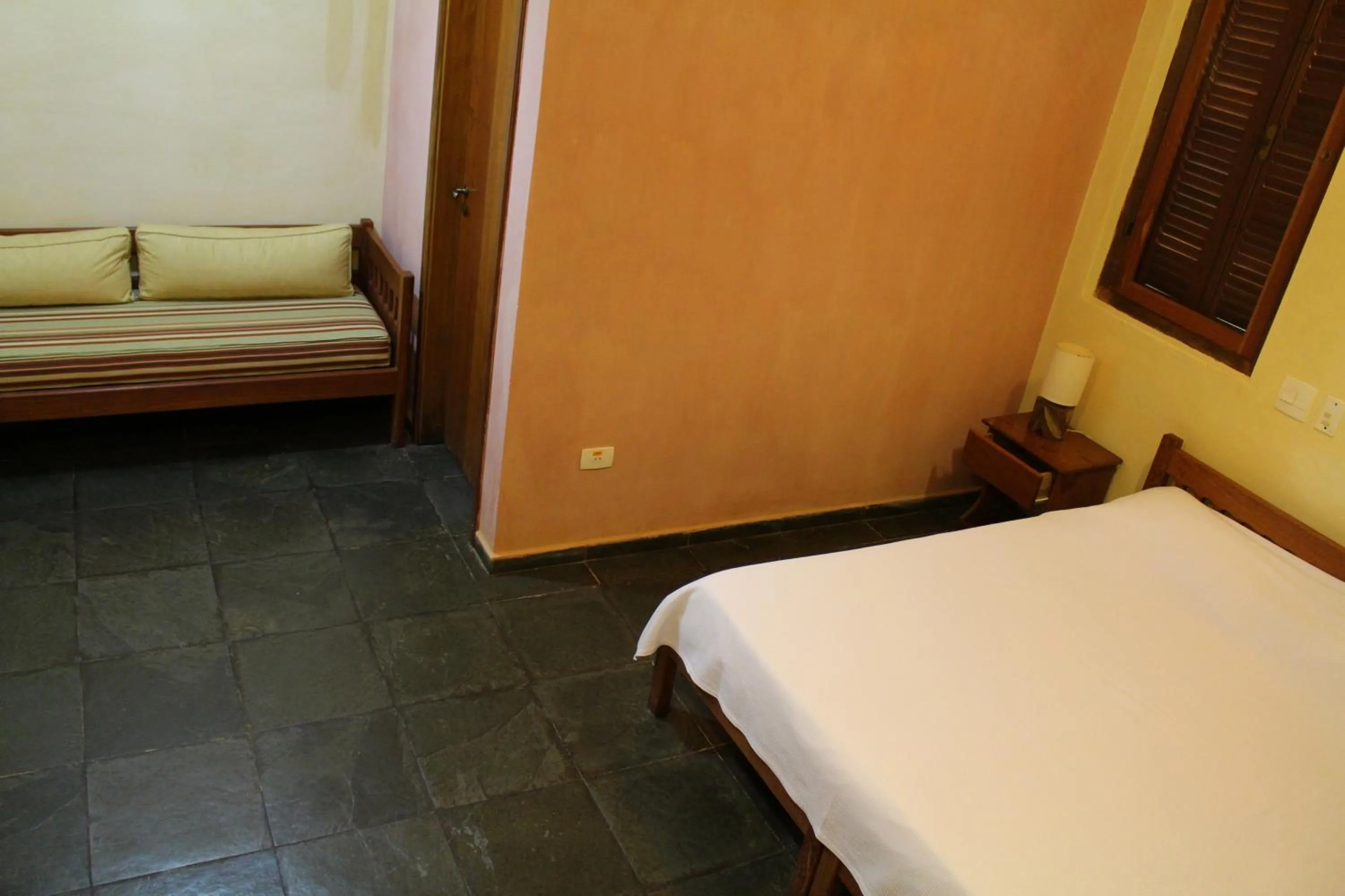 Bed in Pousada Canto Verde