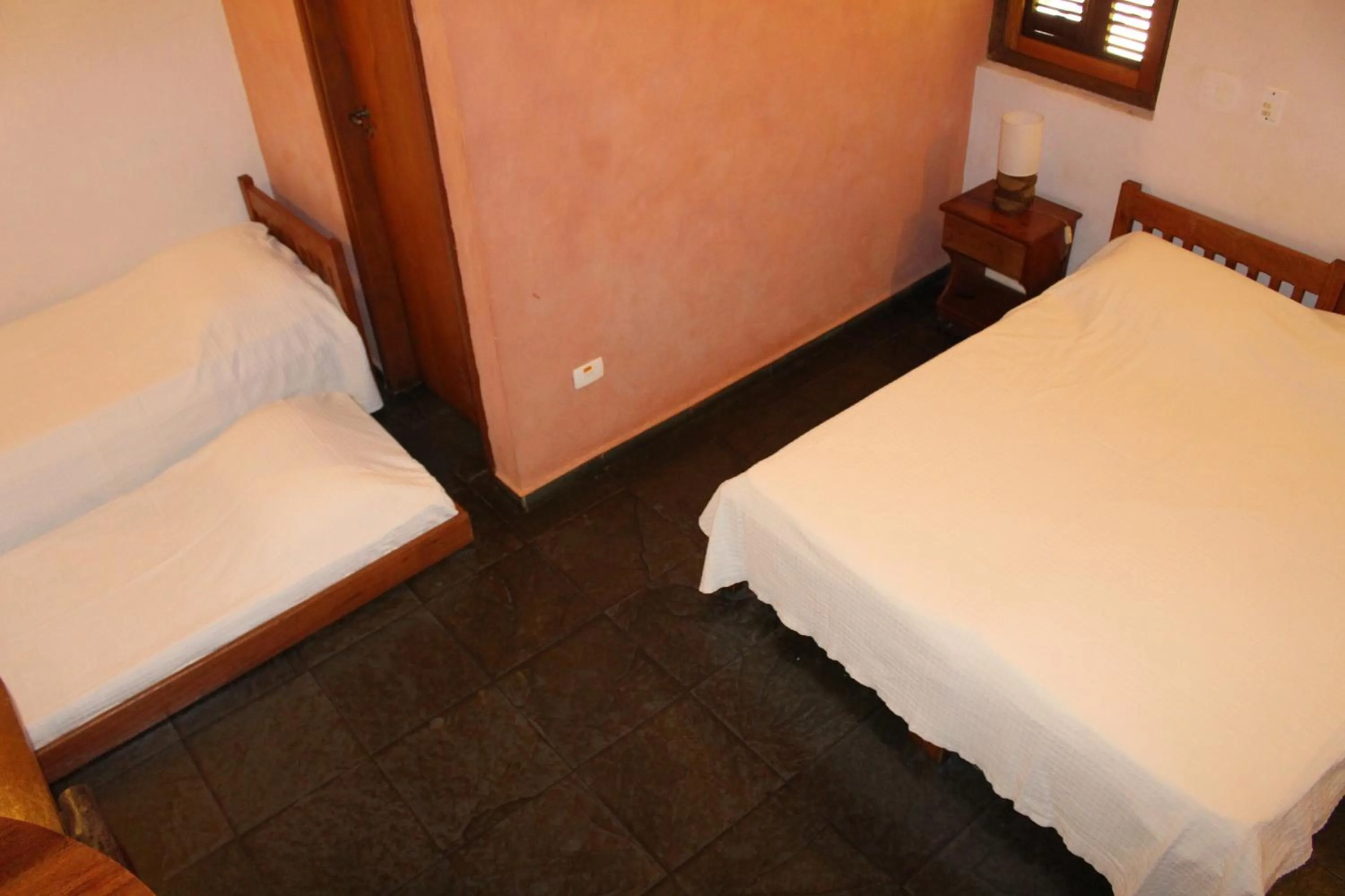 Bed in Pousada Canto Verde