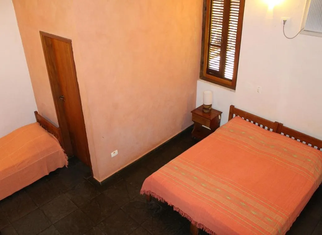 Bed in Pousada Canto Verde
