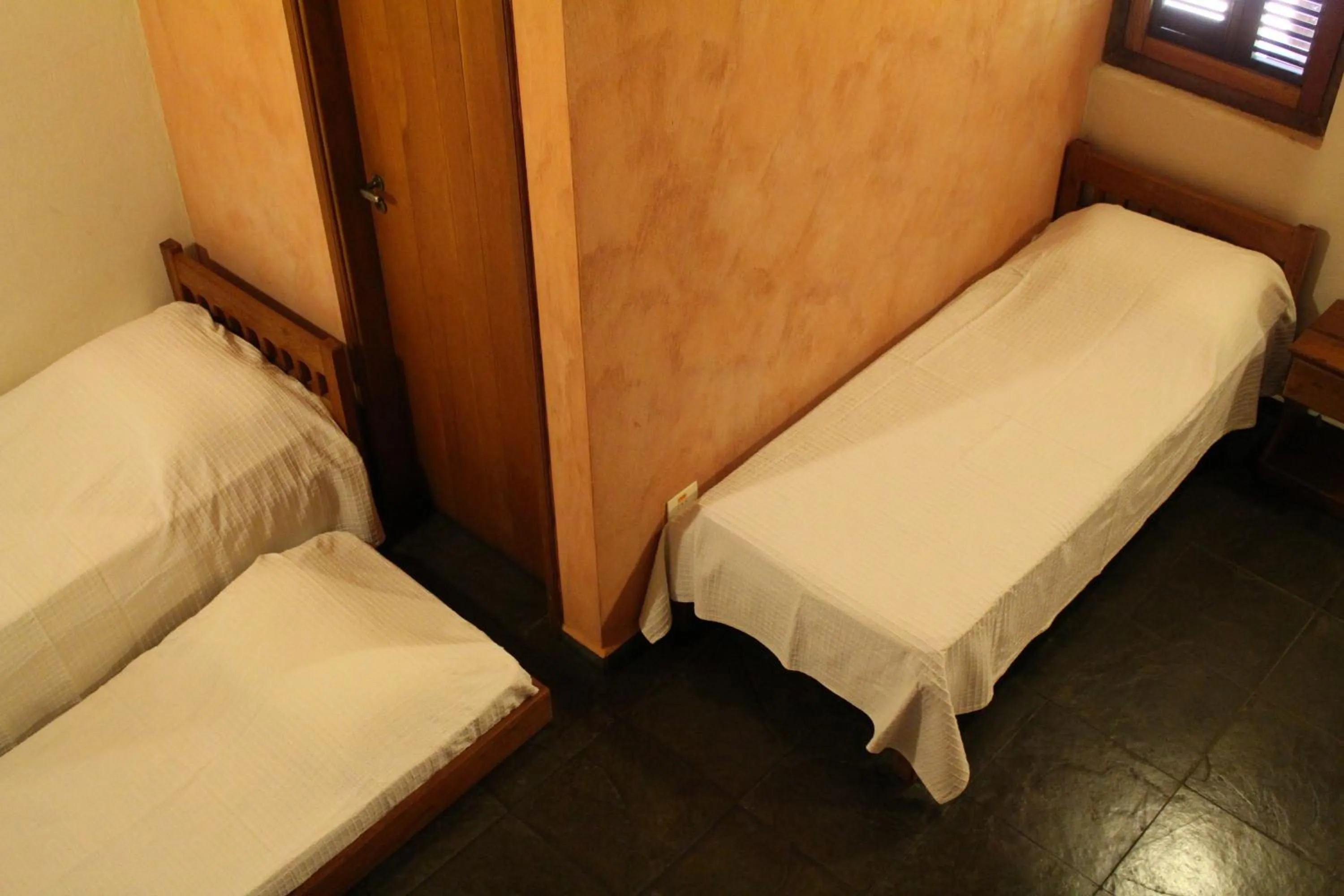 Bed in Pousada Canto Verde