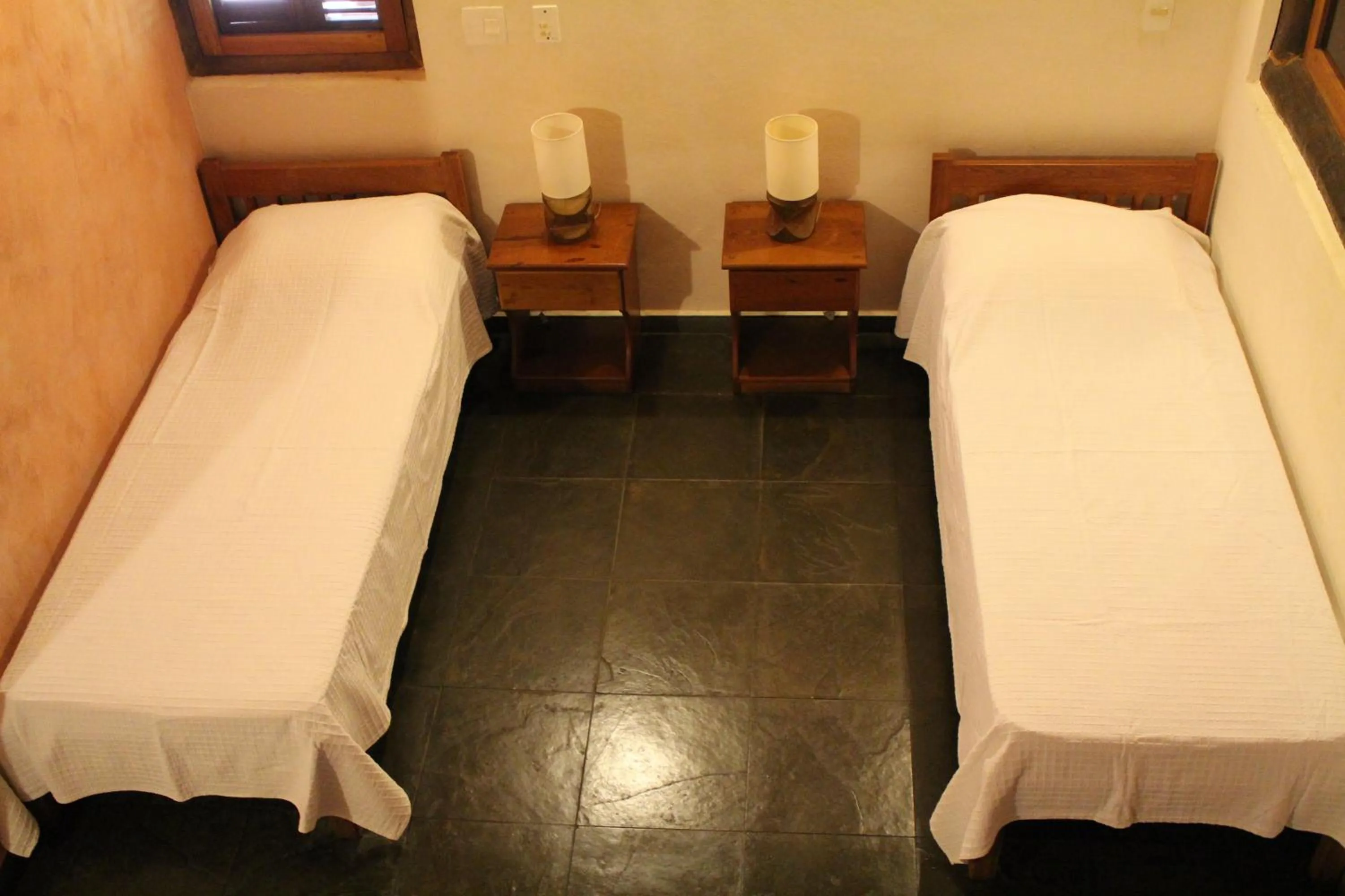 Bed in Pousada Canto Verde