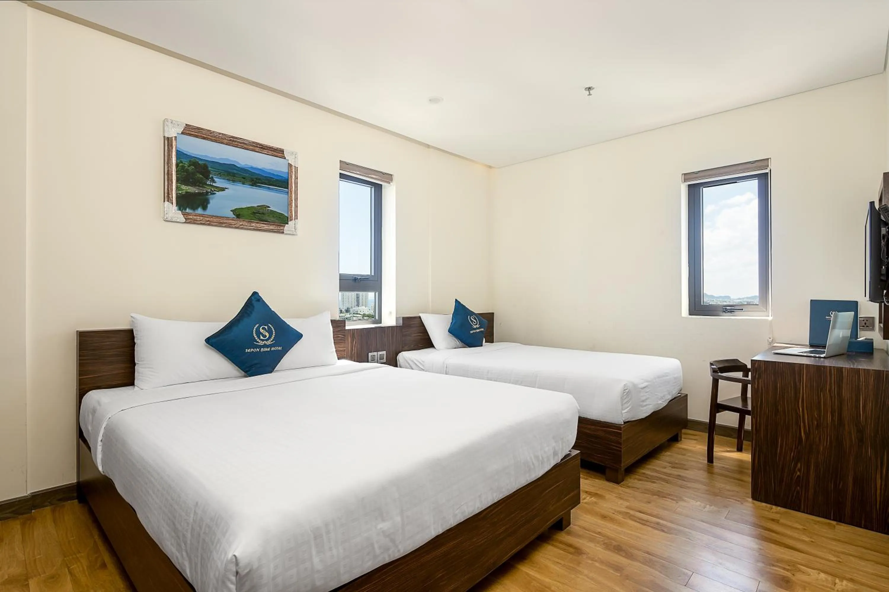 Bed in Sepon Blue Hotel