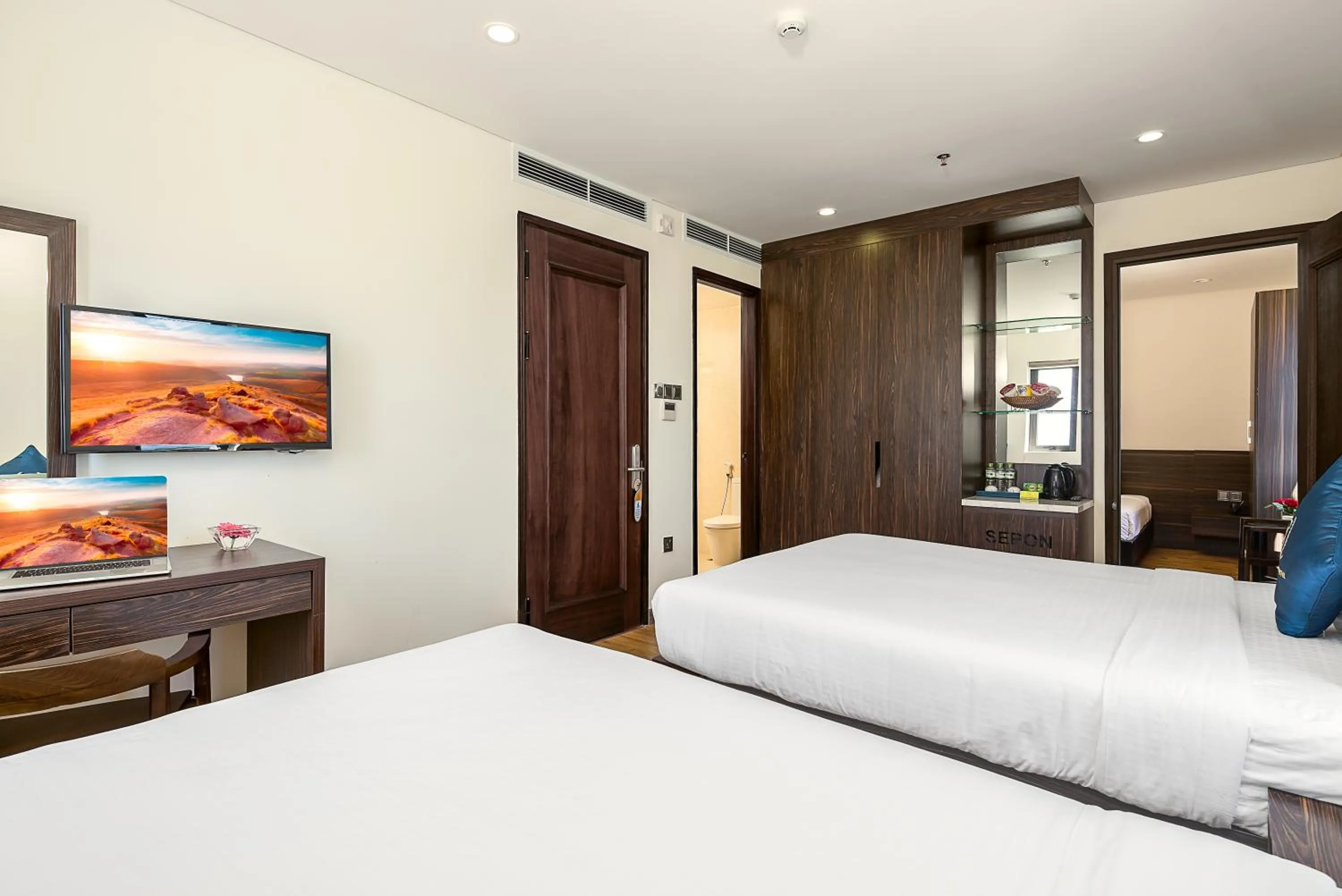 Bed in Sepon Blue Hotel