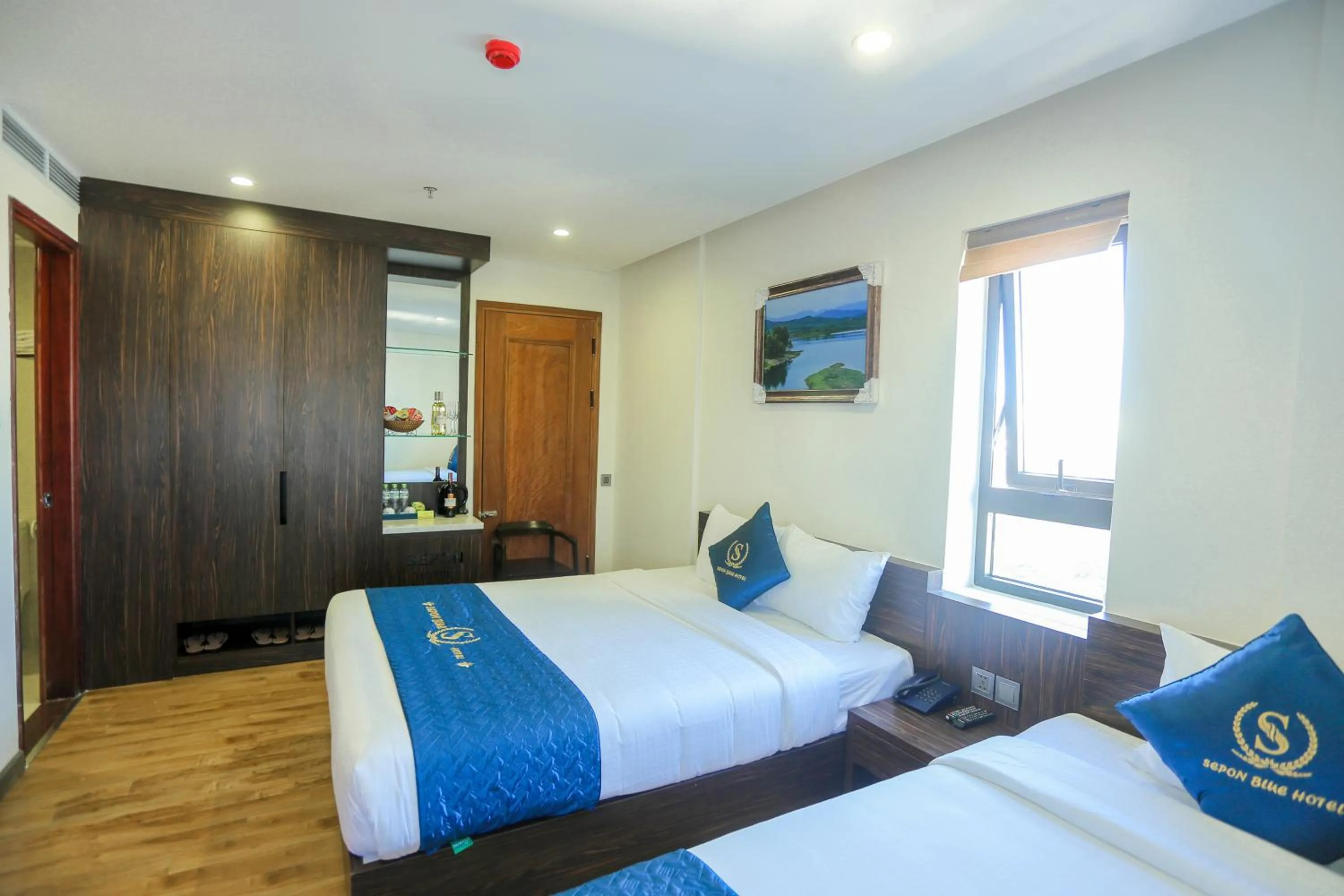 Bed in Sepon Blue Hotel