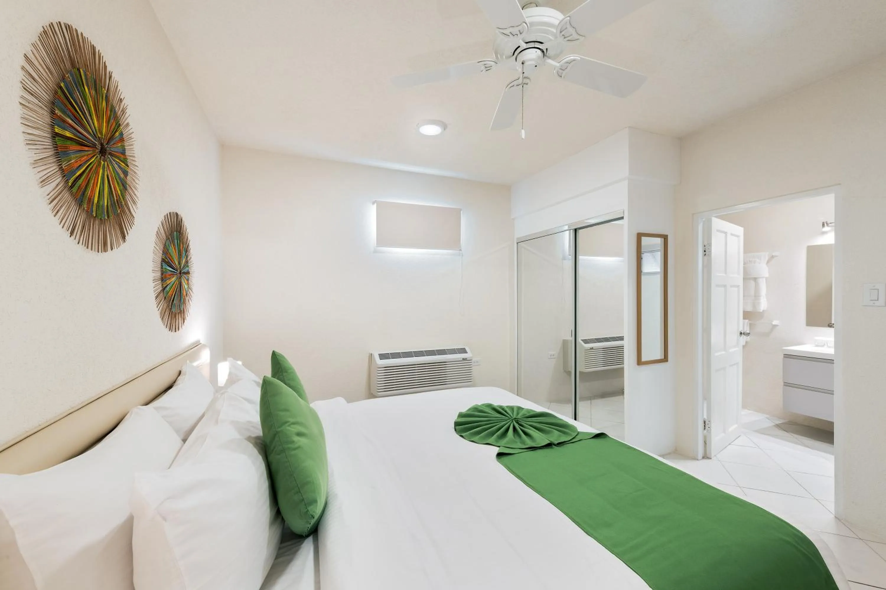 Bed in Coconut Court Beach Hotel