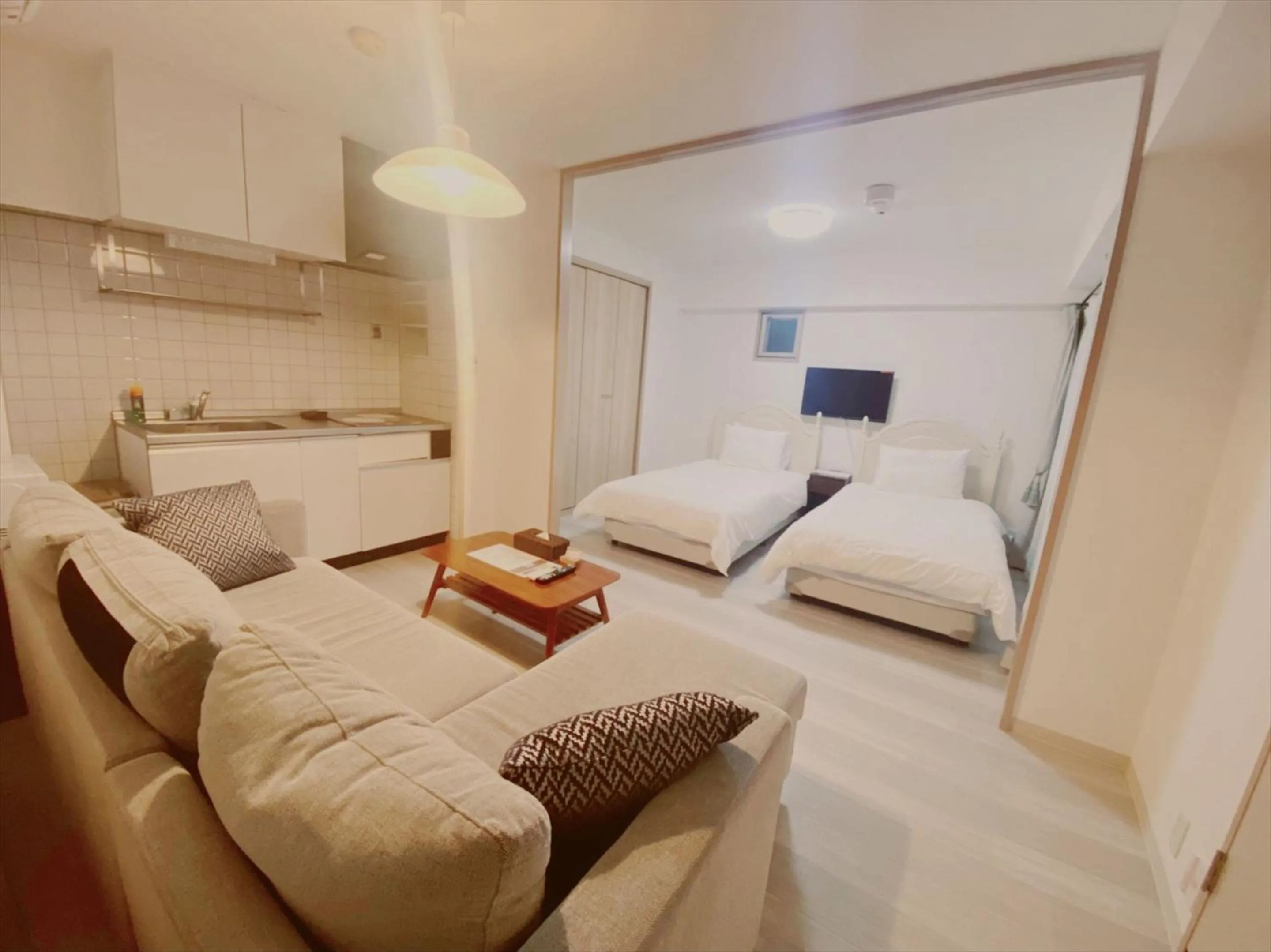 Living room, Bed in Apartment HOTEL KIRO Kyoto STATION