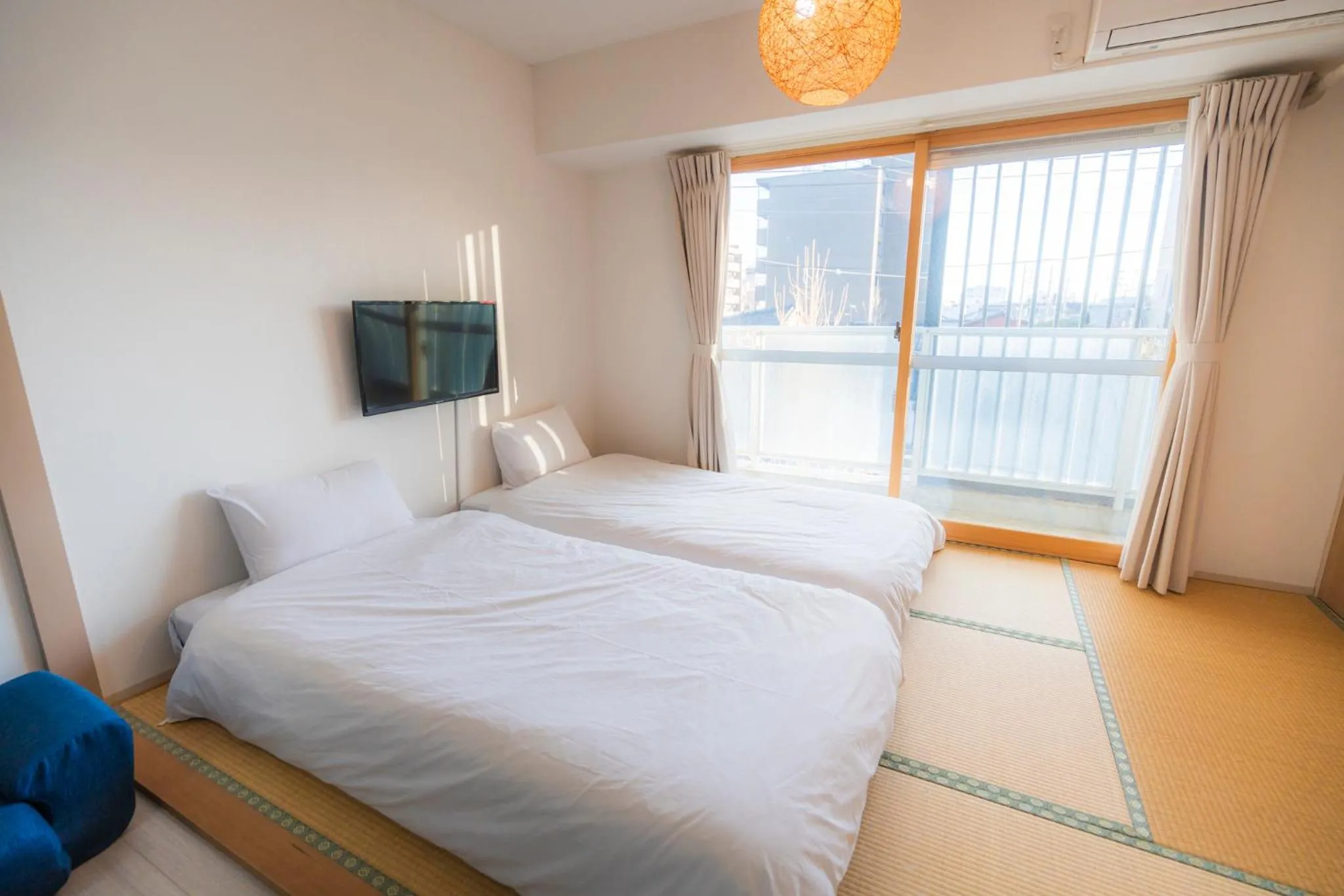 Bed in Apartment HOTEL KIRO Kyoto STATION