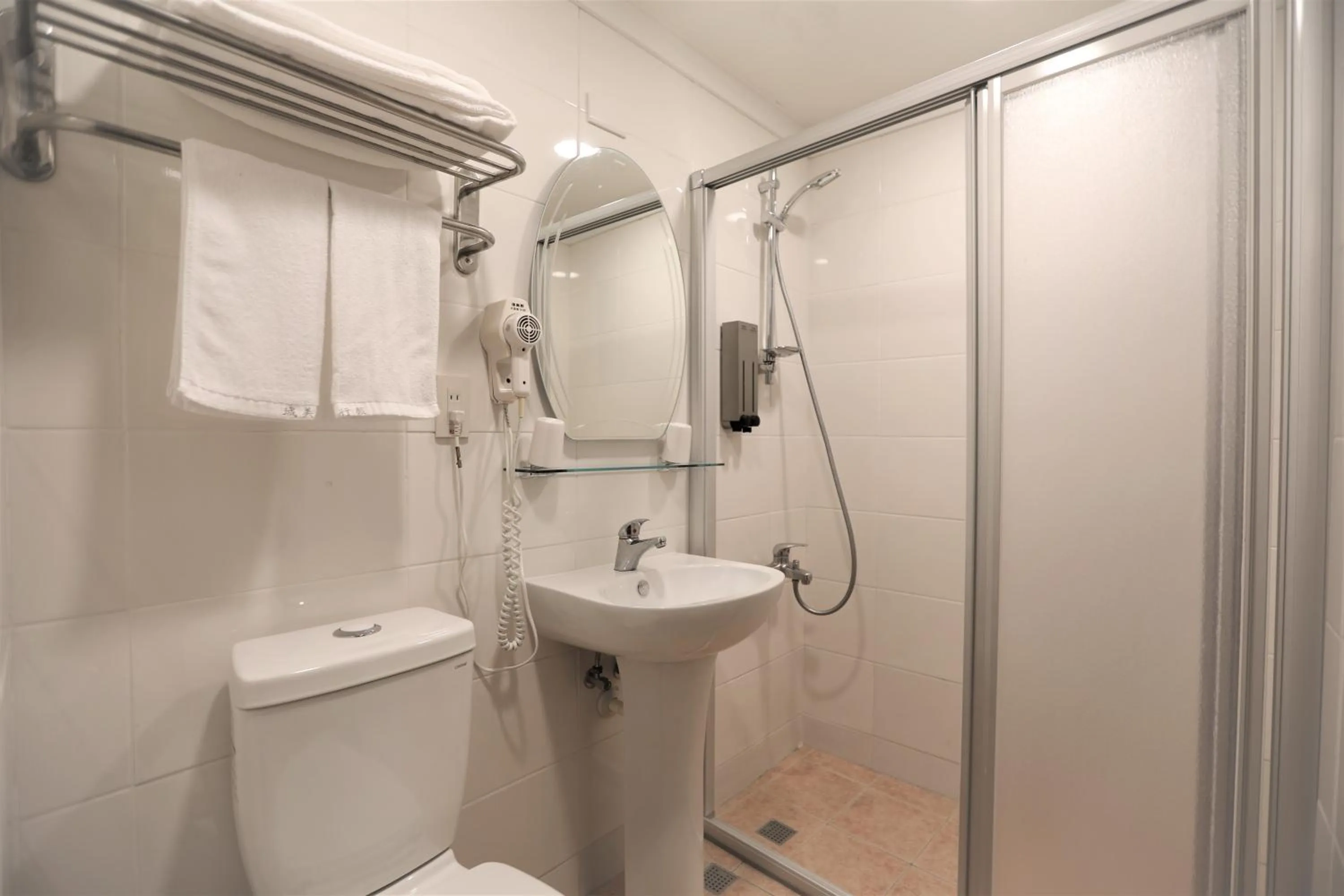 Shower in Chair Man Hotel