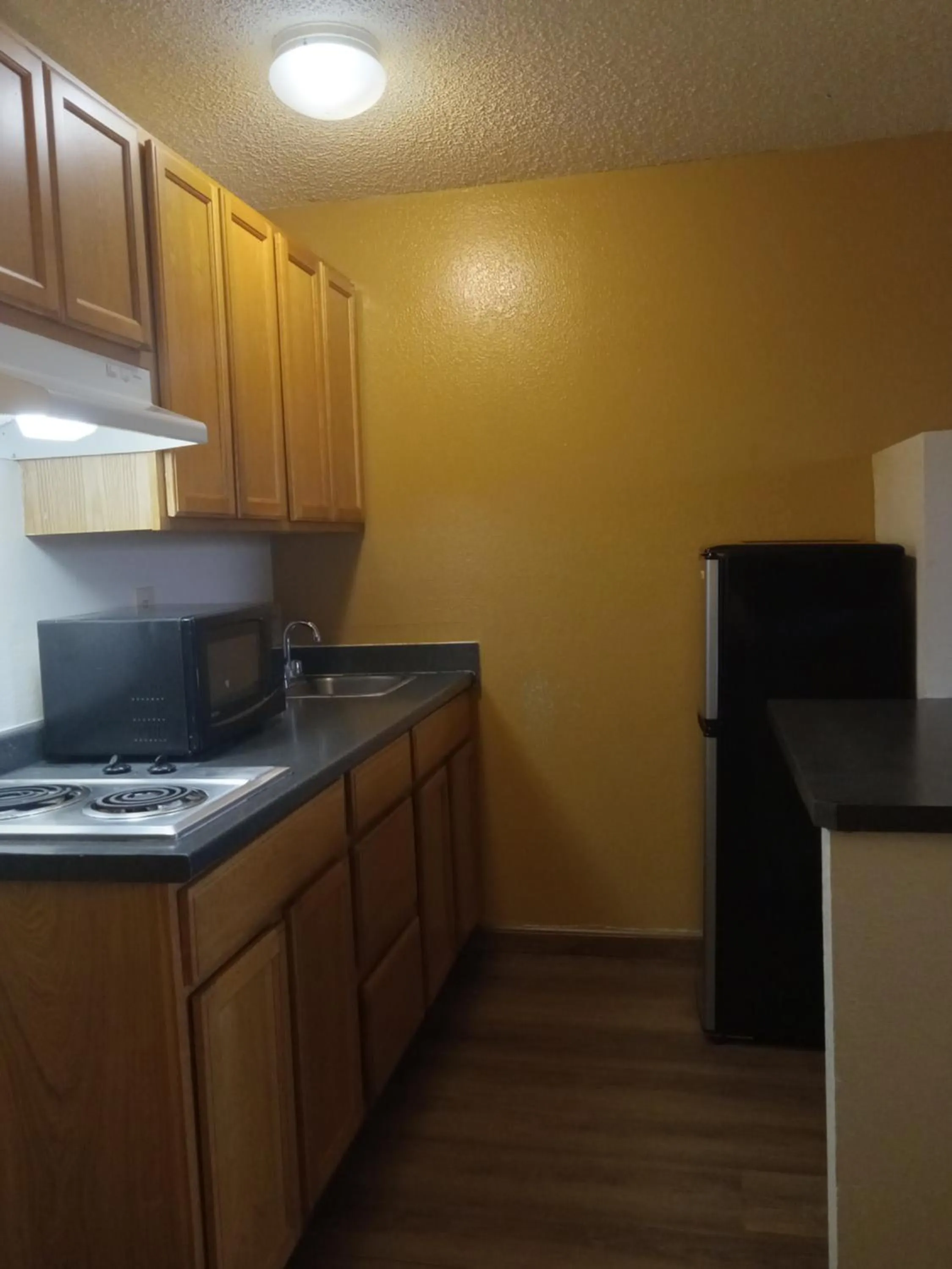 Kitchen or kitchenette, Kitchen/Kitchenette in Travelodge by Wyndham Sunnyside