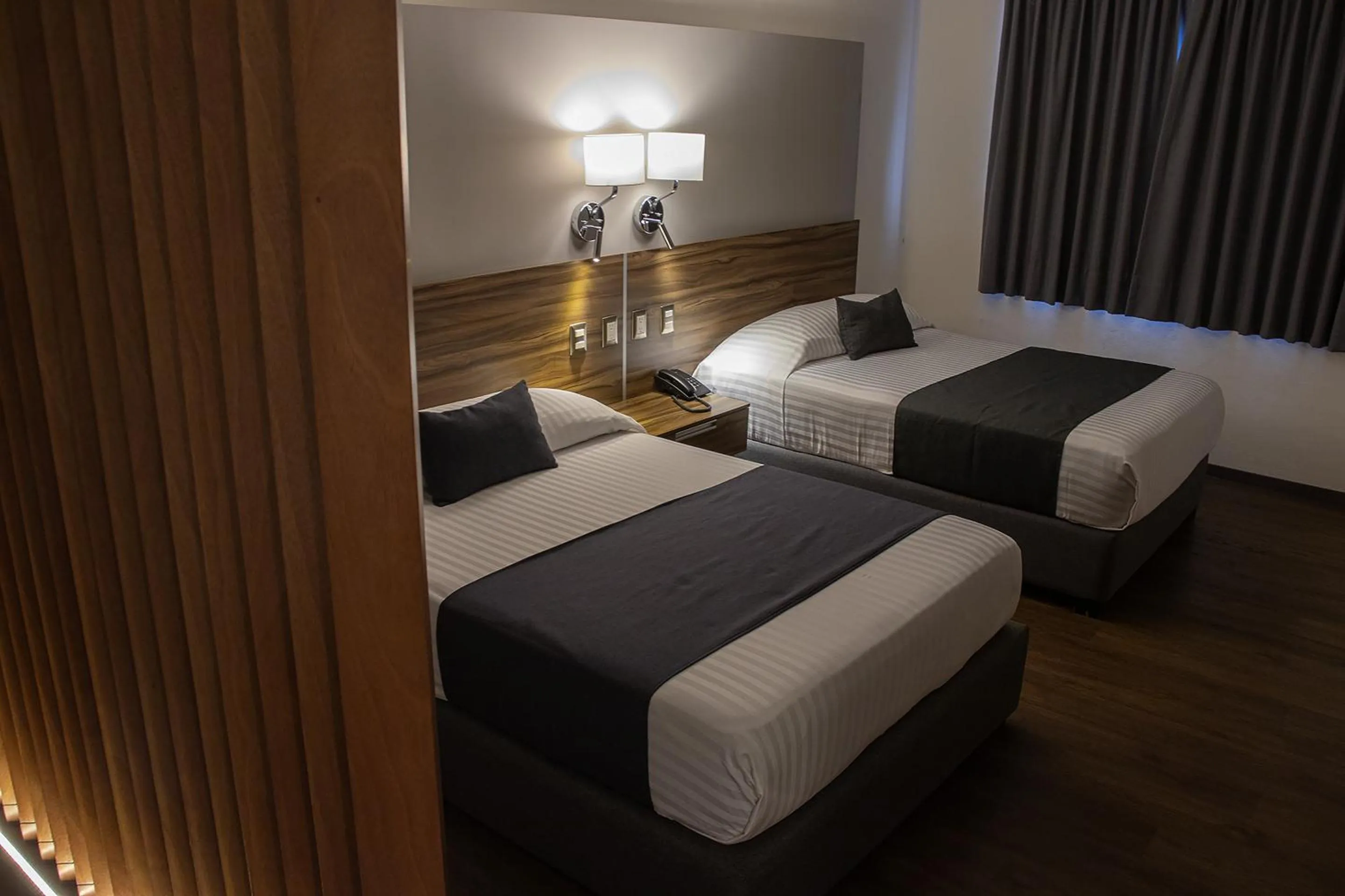 Bedroom, Bed in Estanza Hotel & Suites