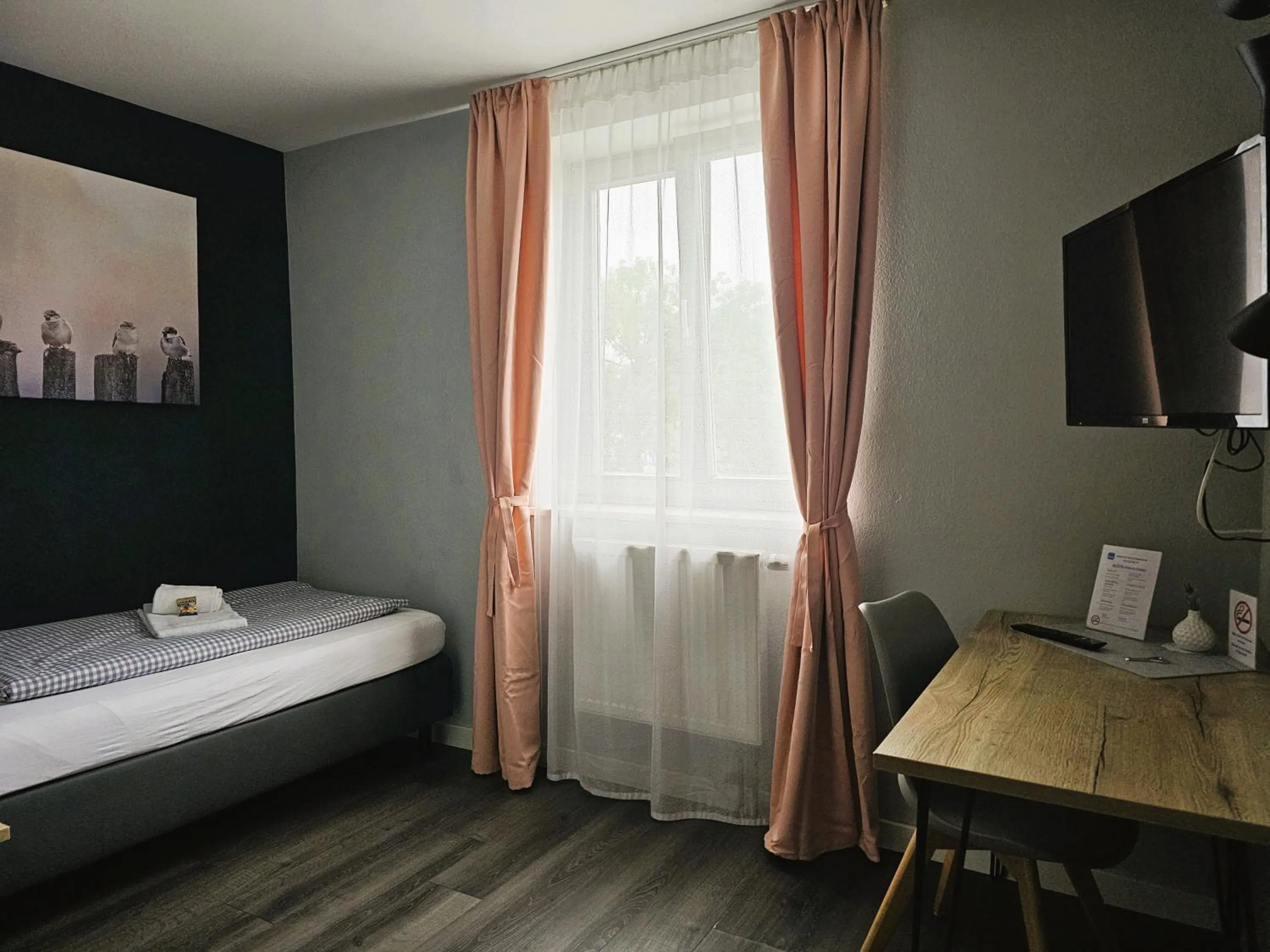 Photo of the whole room, Bed in ARRIVEL Pension Pliening - bisher Novitel
