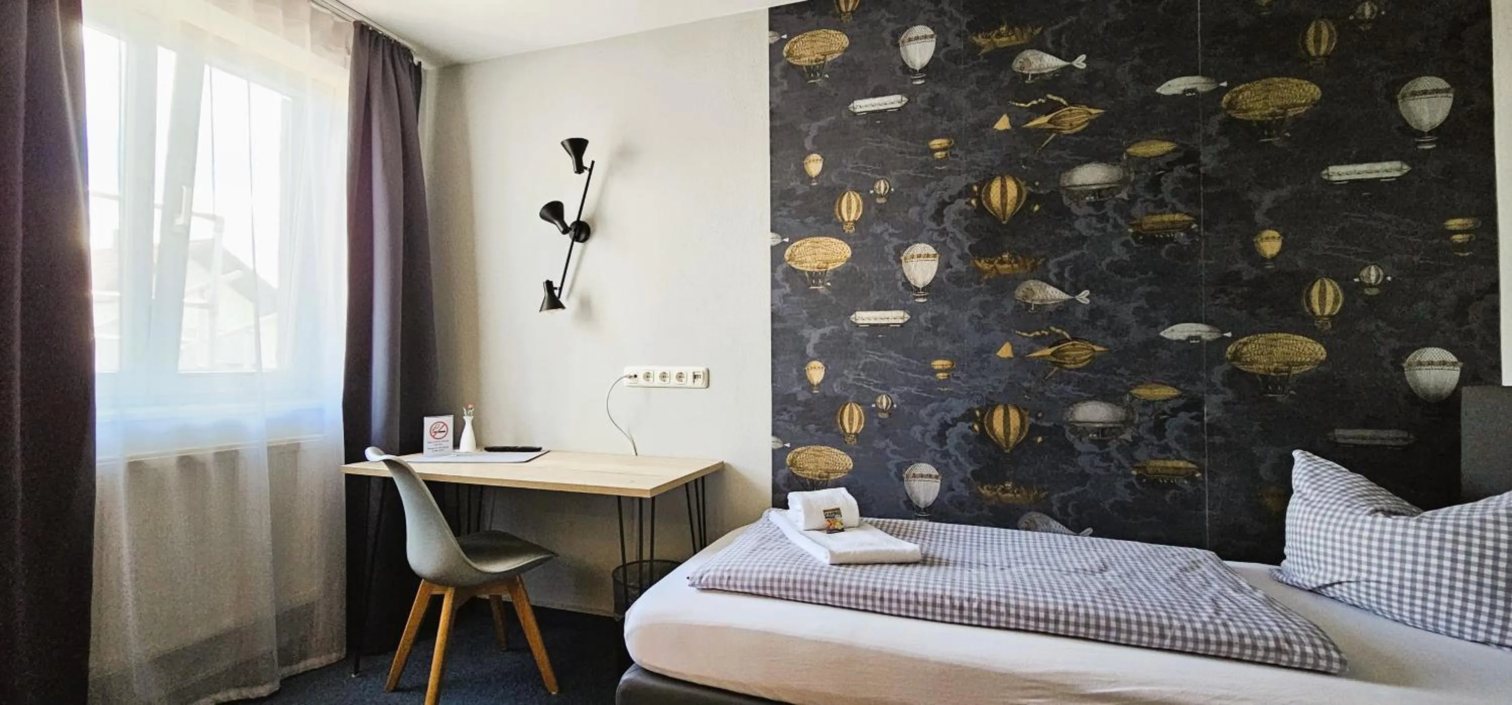 Photo of the whole room, Bed in ARRIVEL Pension Pliening - bisher Novitel