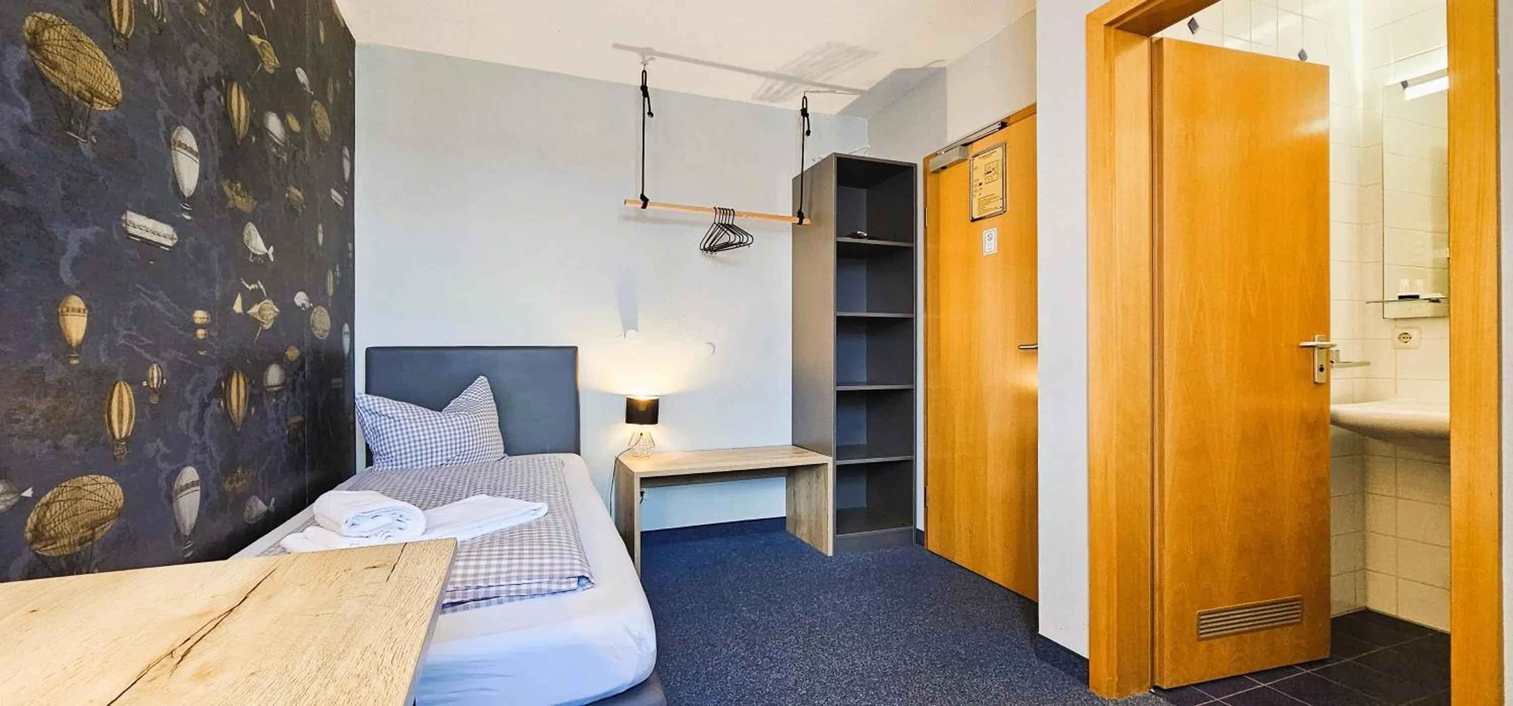 Photo of the whole room, Bed in ARRIVEL Pension Pliening - bisher Novitel