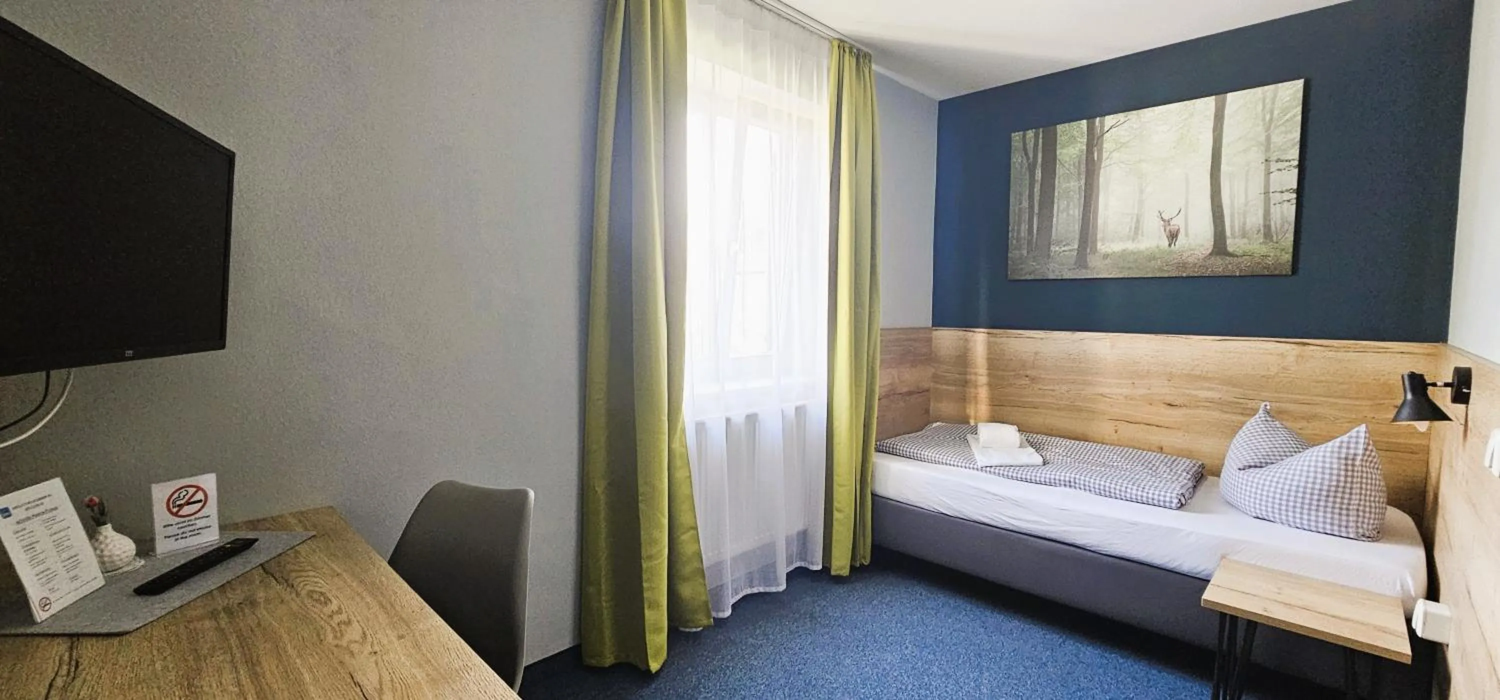 Photo of the whole room, Bed in ARRIVEL Pension Pliening - bisher Novitel