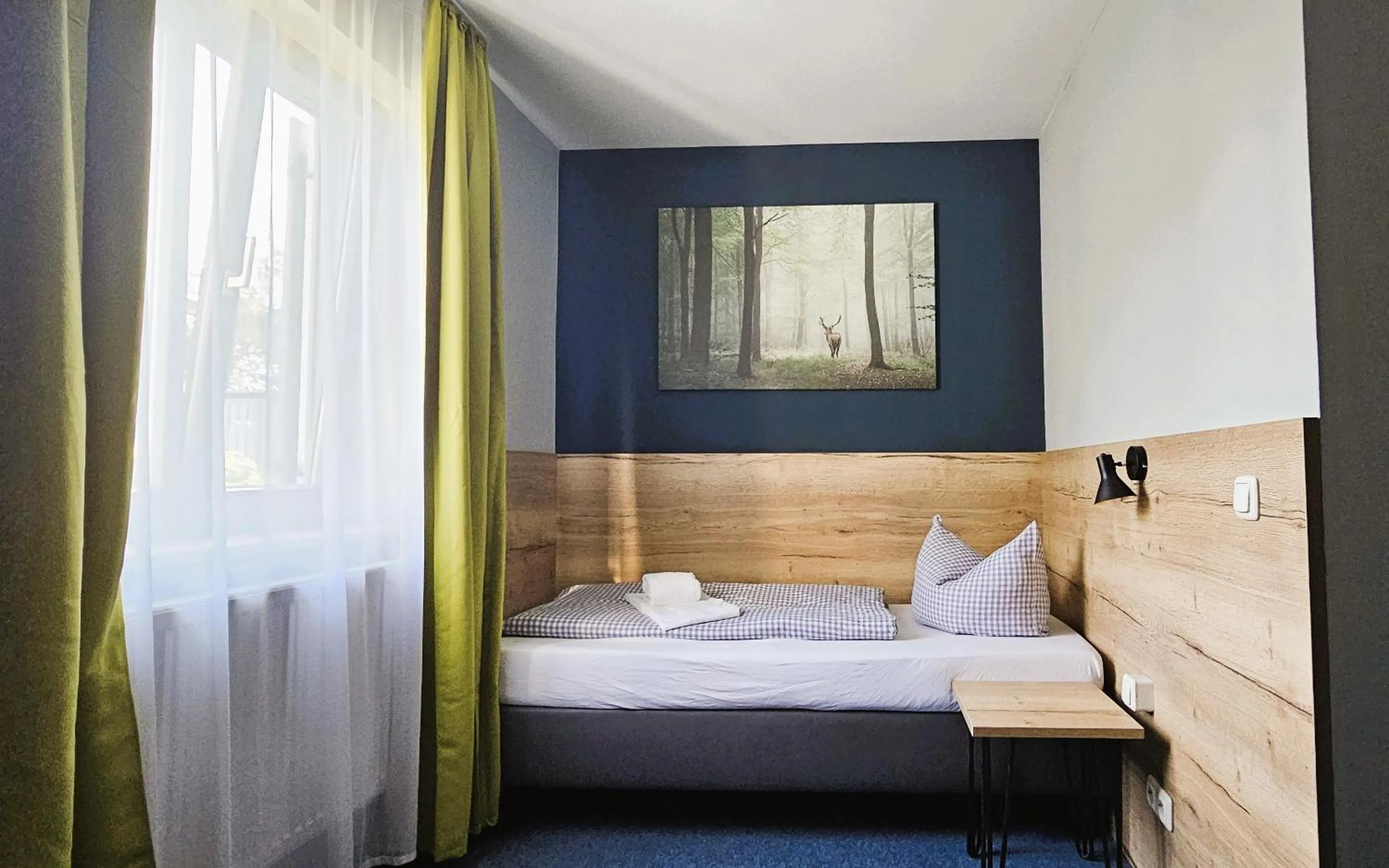 Photo of the whole room, Bed in ARRIVEL Pension Pliening - bisher Novitel