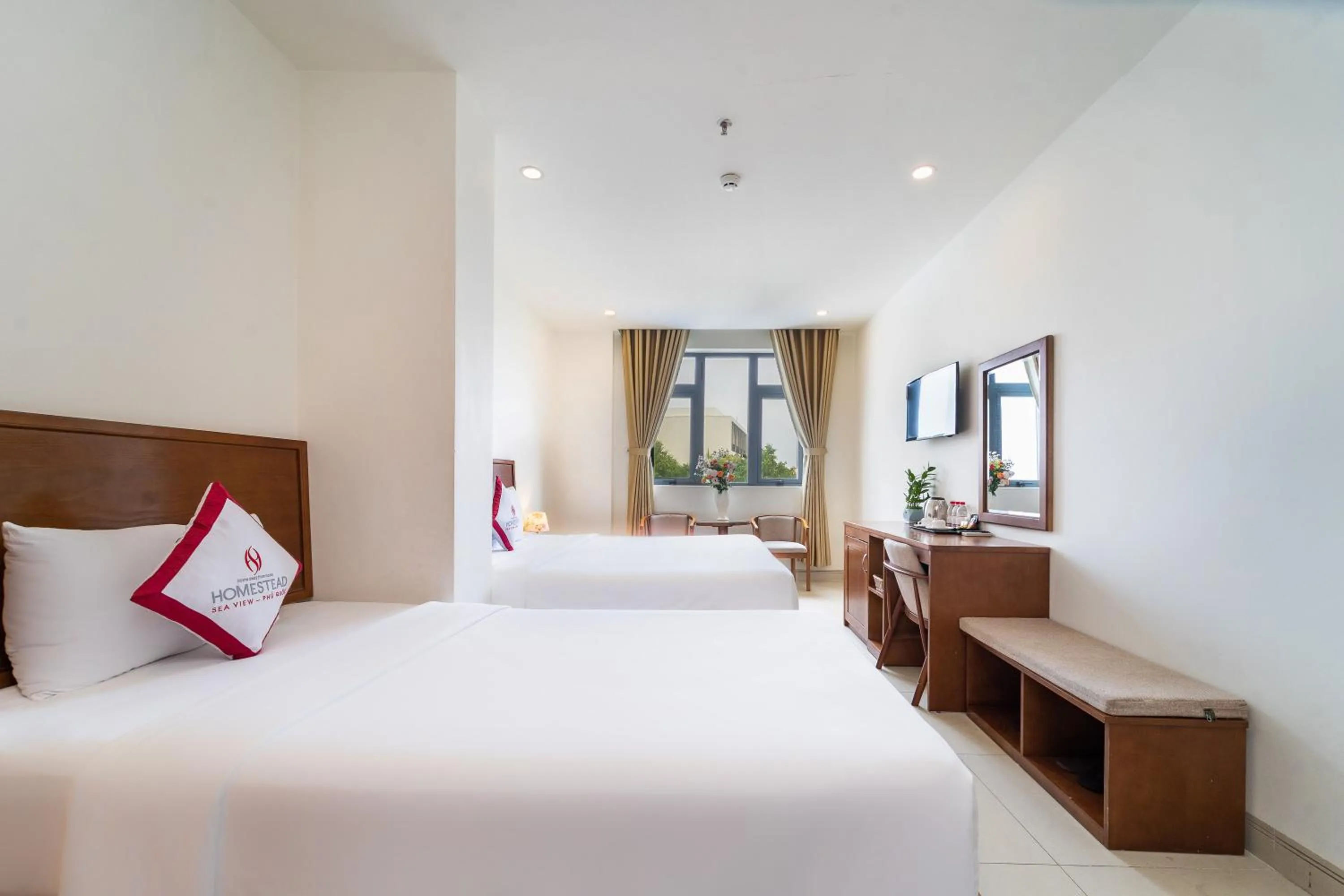 Bed in Homestead Seaview Phu Quoc Hotel