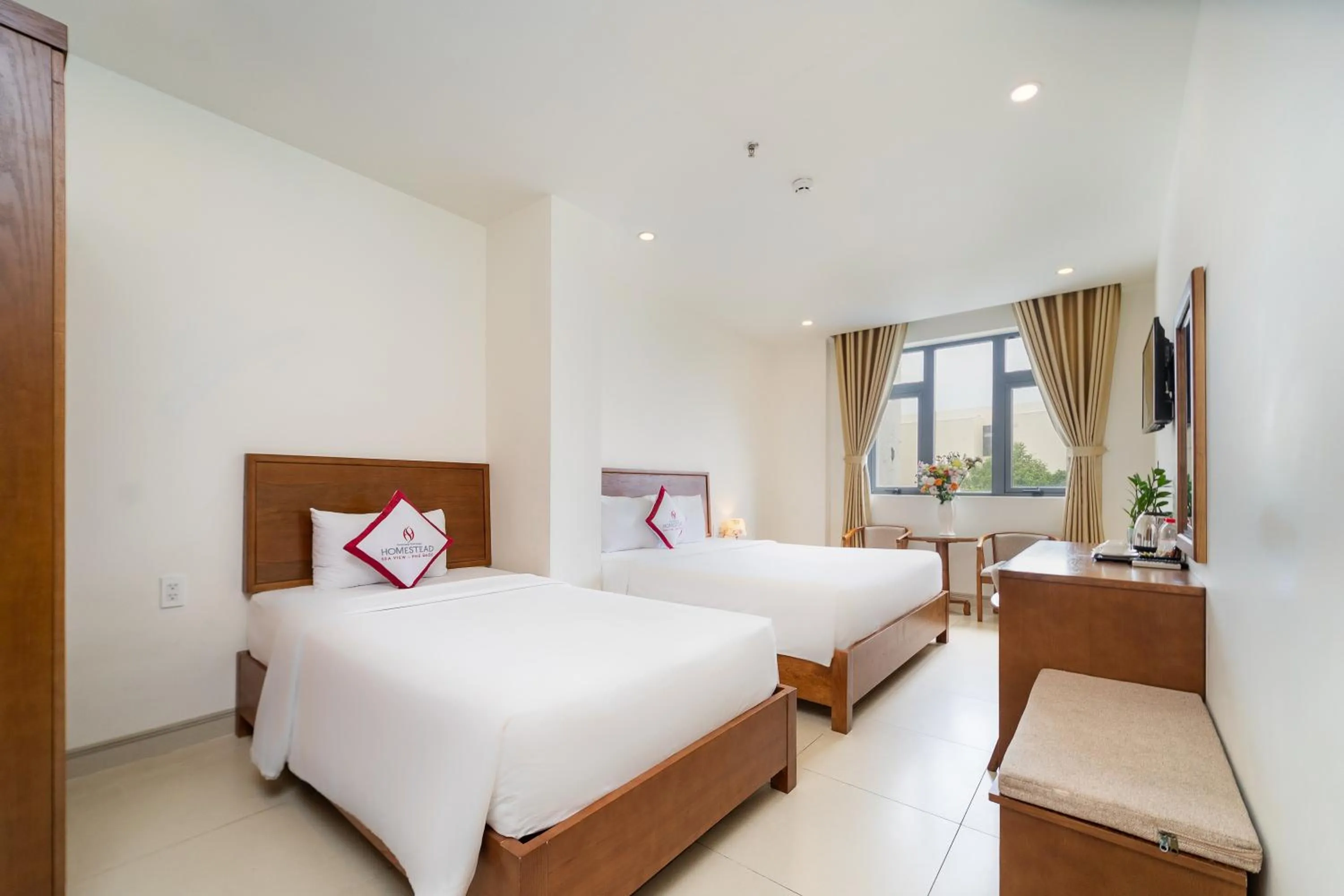 Bed in Homestead Seaview Phu Quoc Hotel