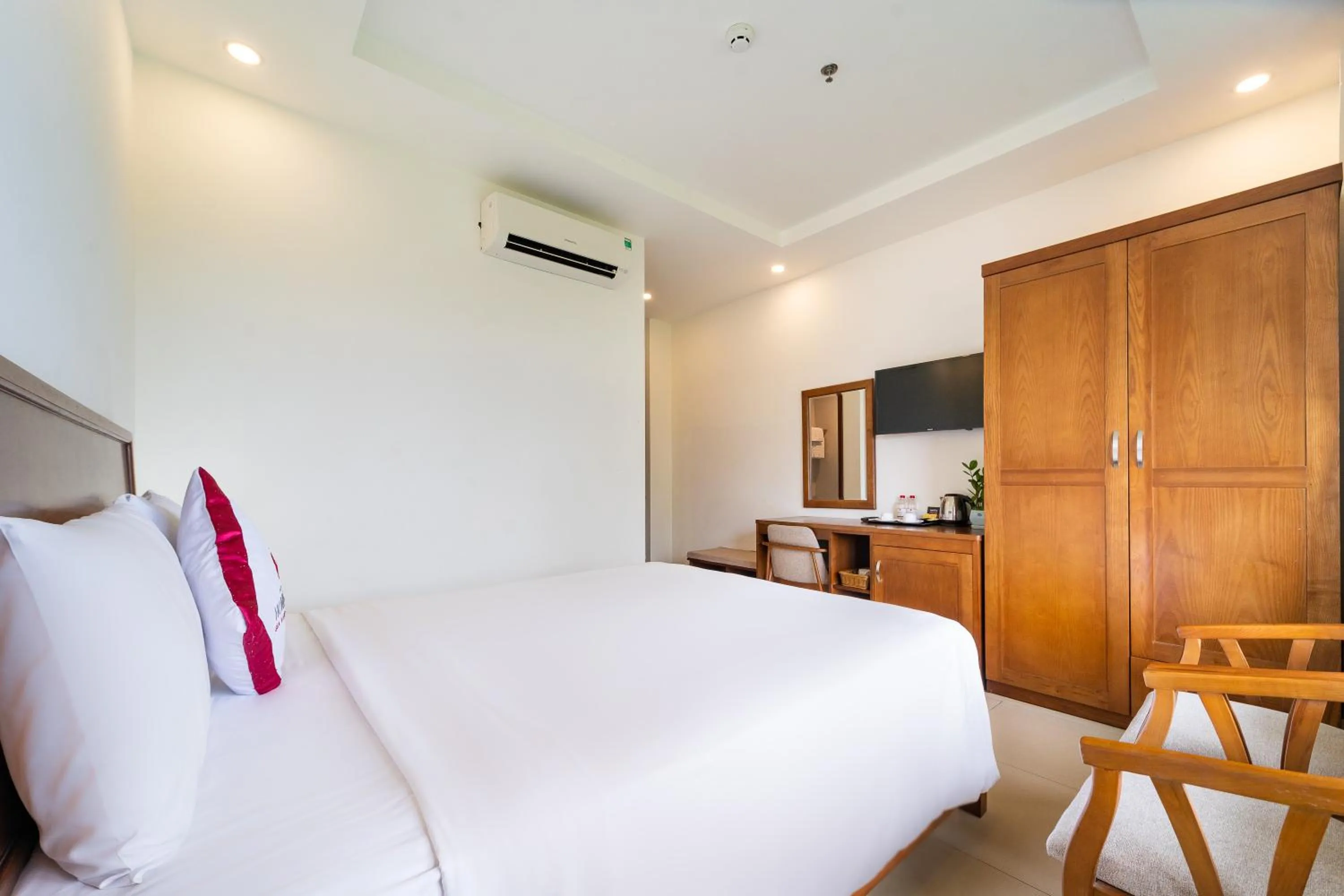 Bed in Homestead Seaview Phu Quoc Hotel