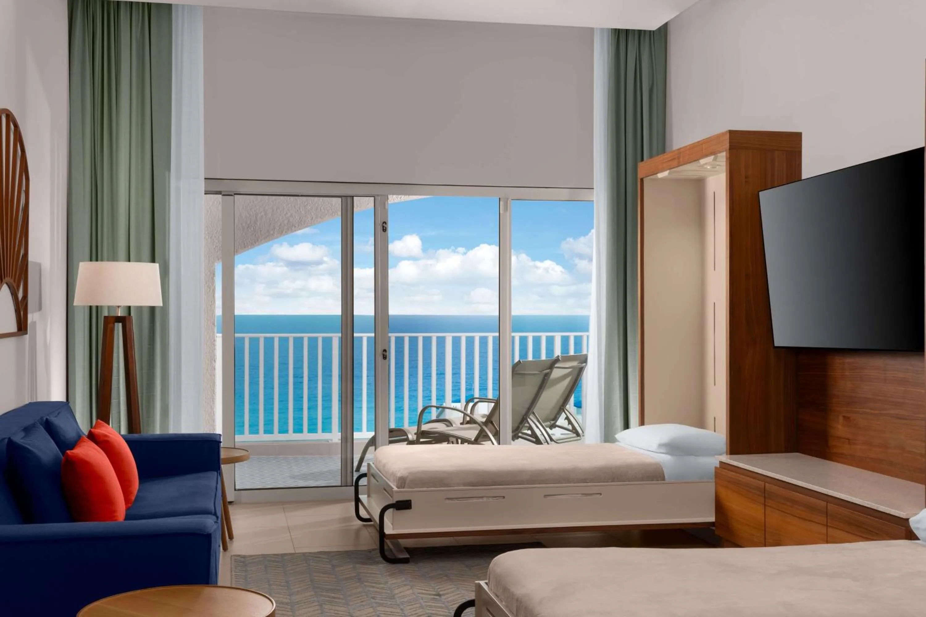 Living room, Bed in Hilton Cancun Mar Caribe All-Inclusive Resort