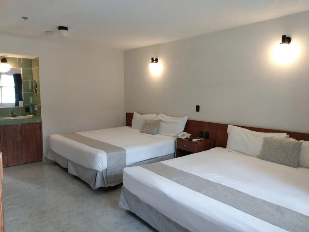 Bed in Dorados Conventions & Resort