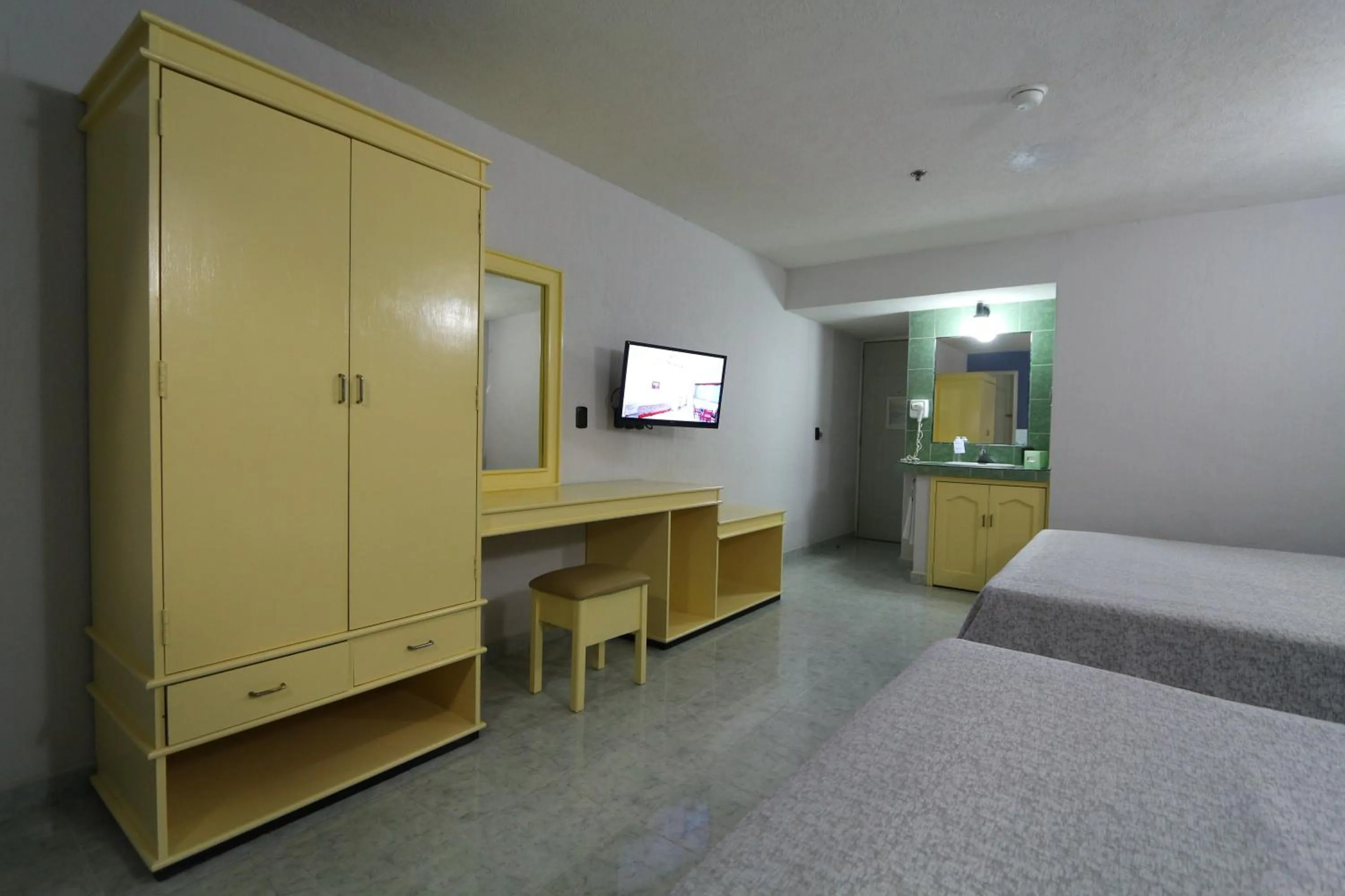 Bed in Dorados Conventions & Resort