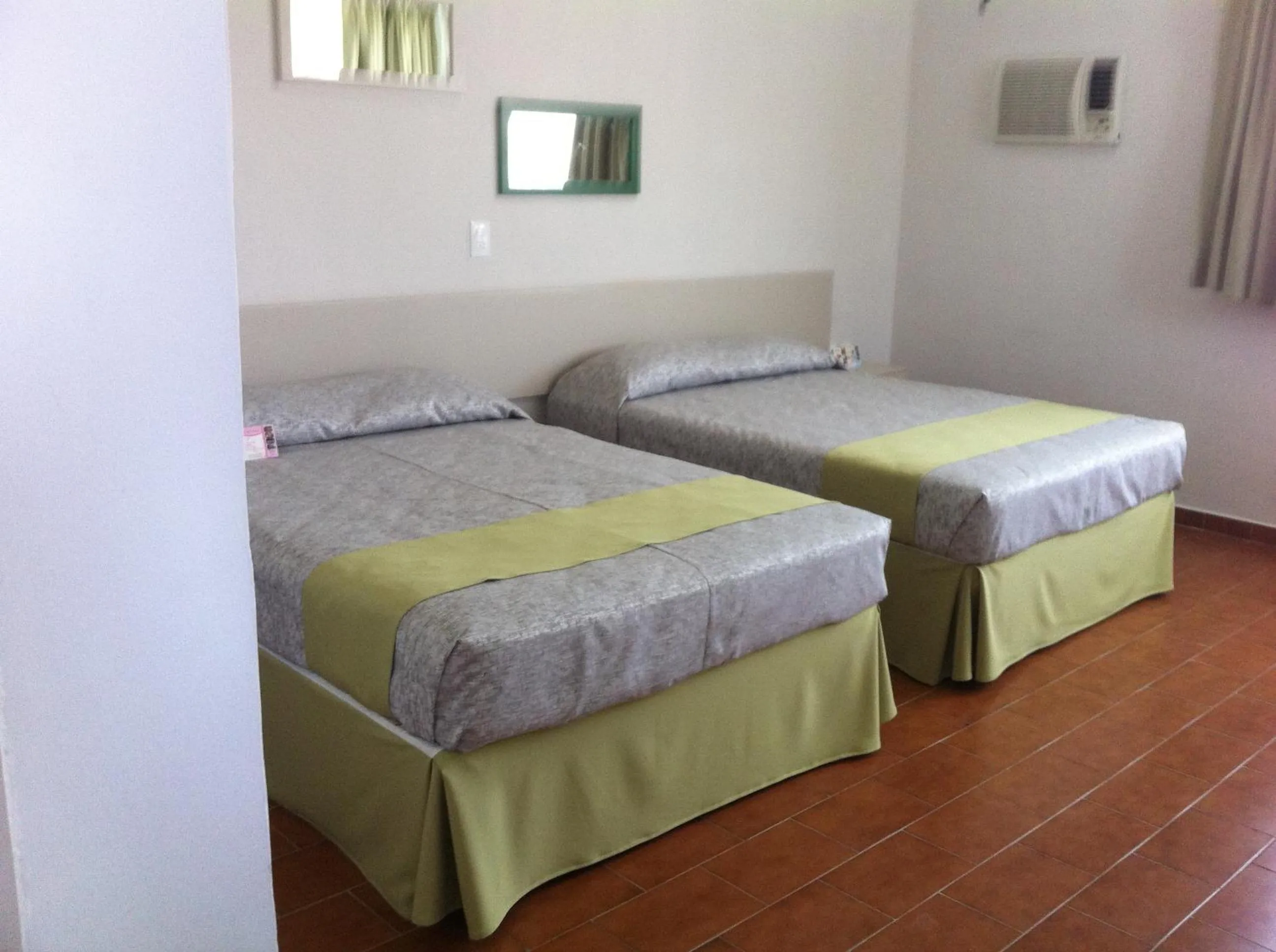 Bed in Dorados Conventions & Resort