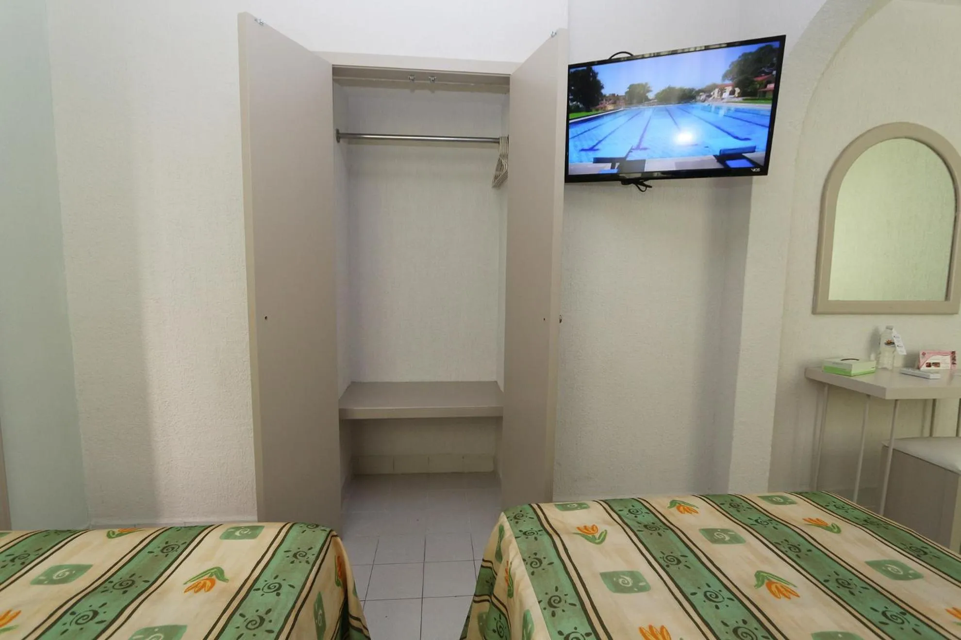 Bed in Dorados Conventions & Resort