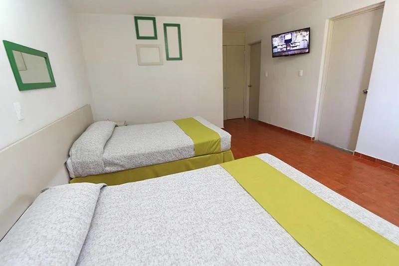 Bed in Dorados Conventions & Resort