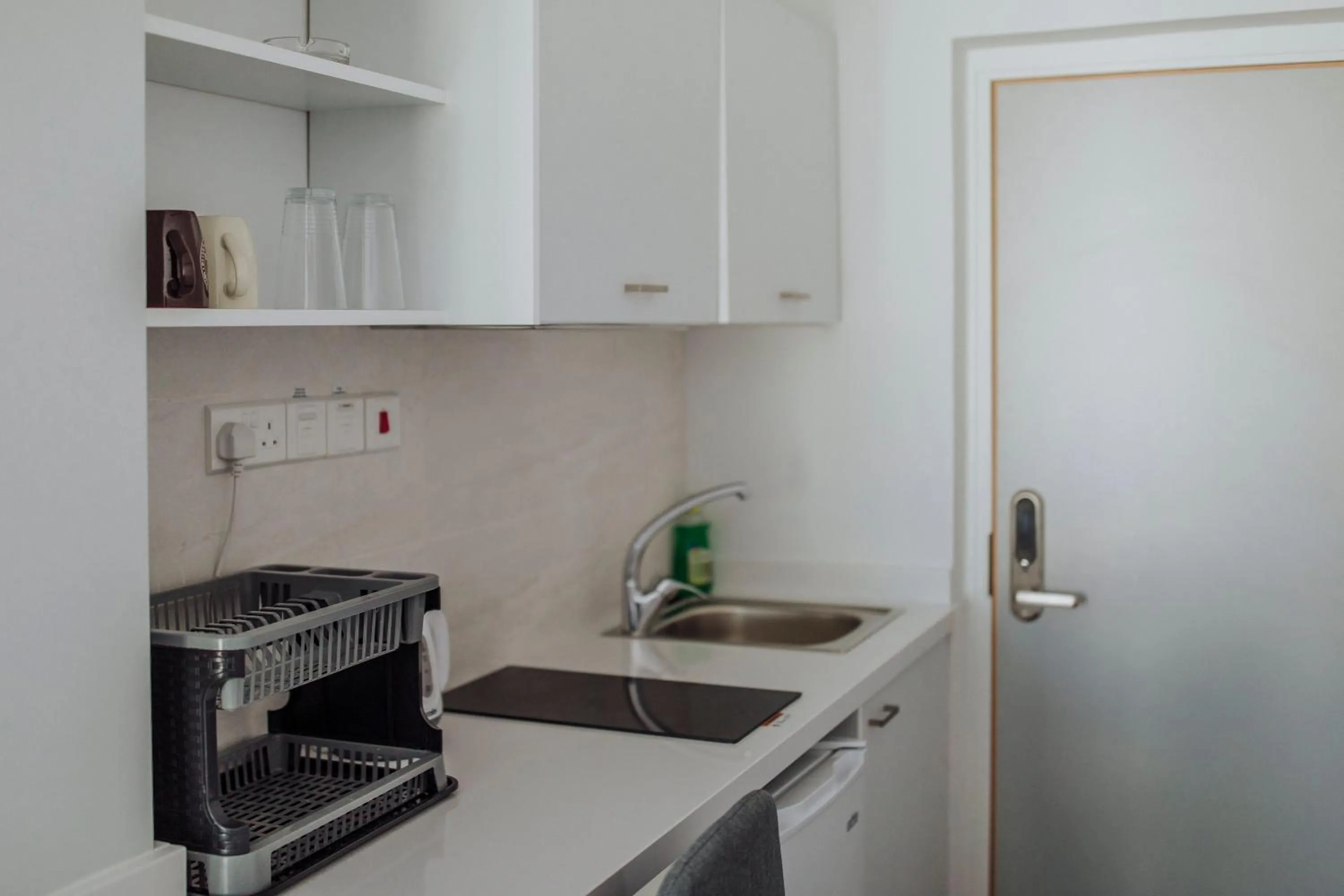 Kitchen or kitchenette in River View Boutique Apts