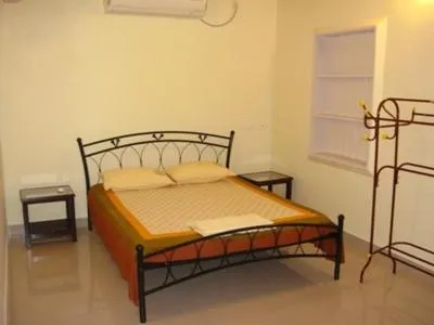 Bed in Palm Grove Service Villa