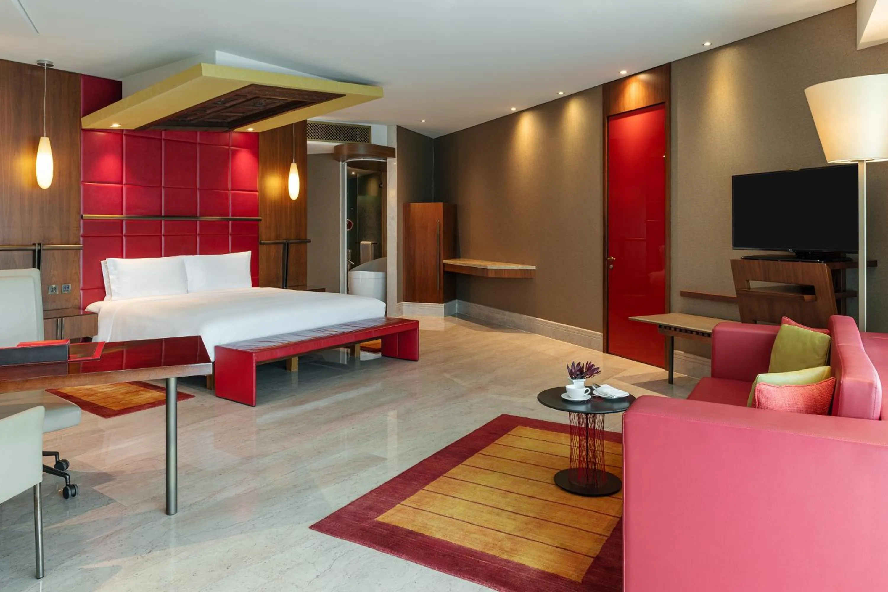 Living room, Bed in The Creekside Hotel, Dubai - an Accor Hotel