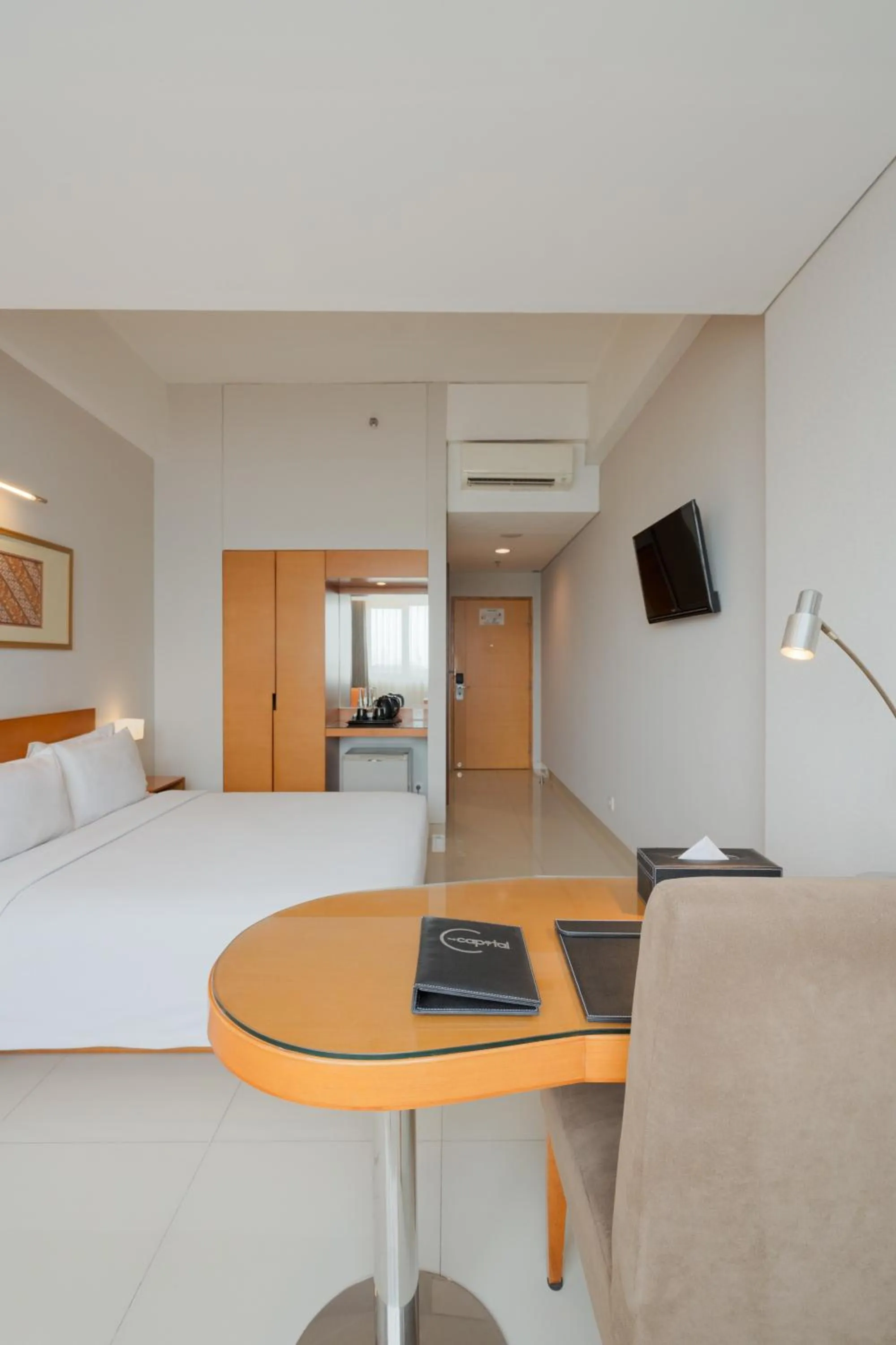 Bedroom, Bed in The Capital Hotel Surabaya