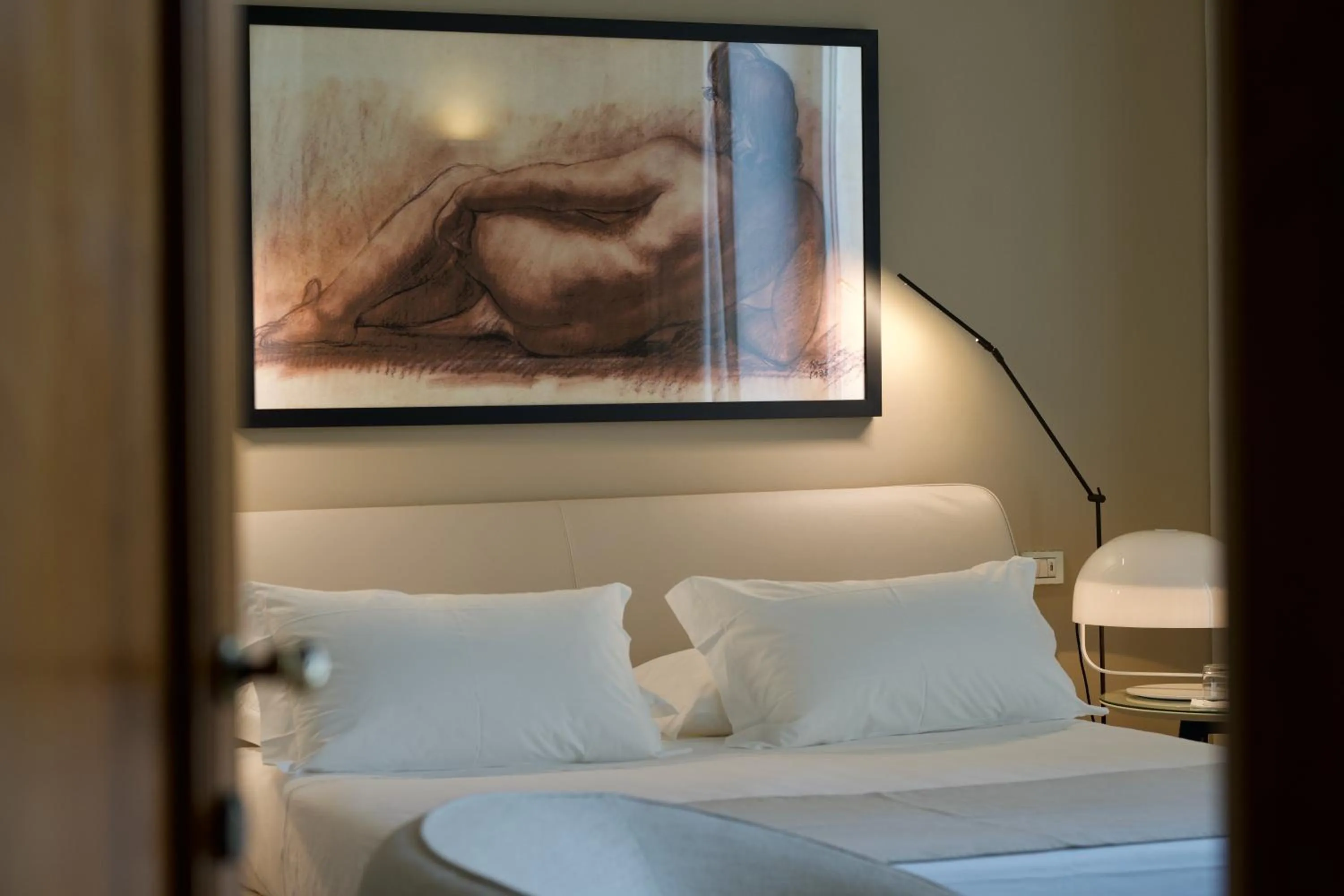 Bed in La Fiermontina Palazzo Bozzi Corso Hotel