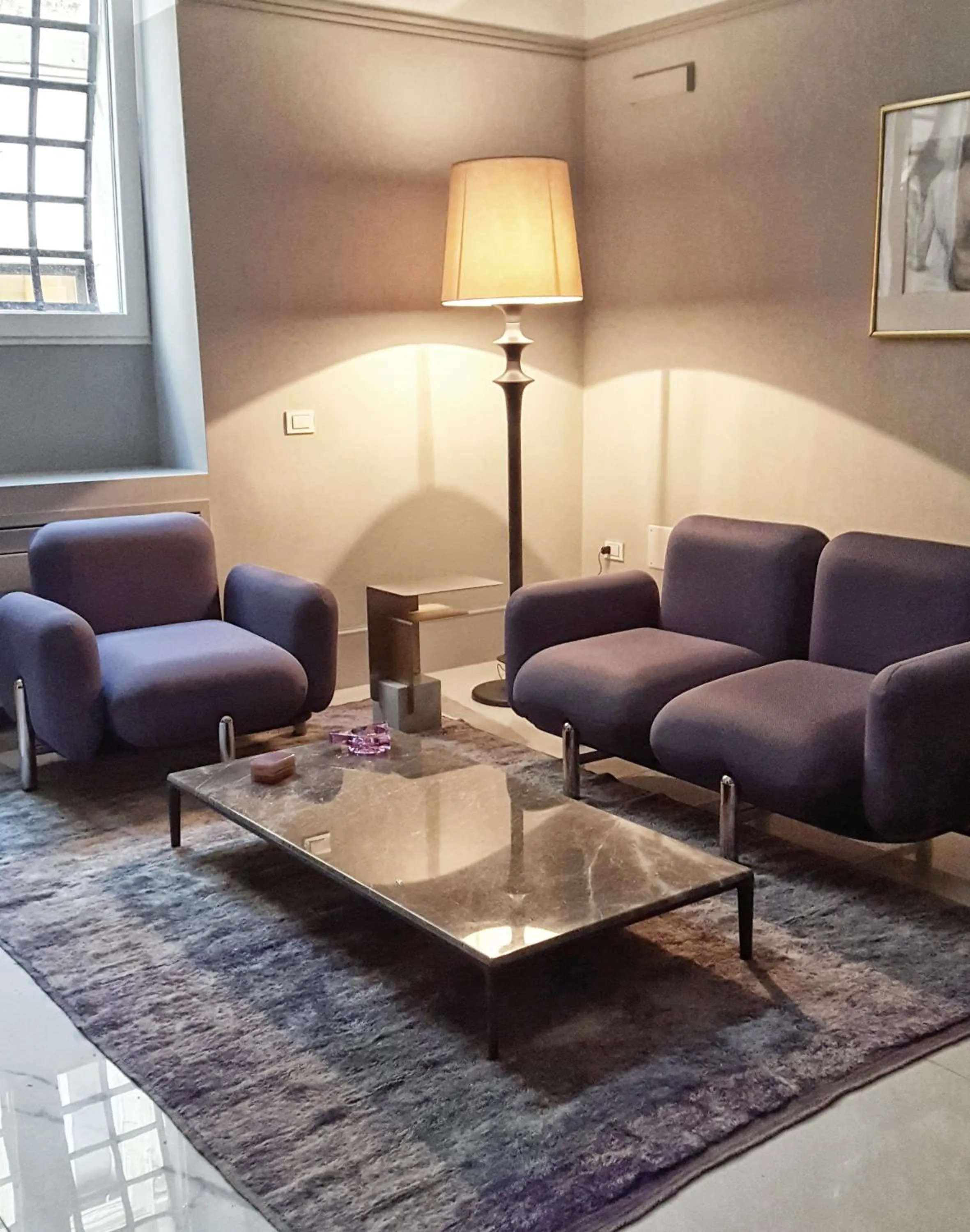 Living room in La Fiermontina Palazzo Bozzi Corso Hotel