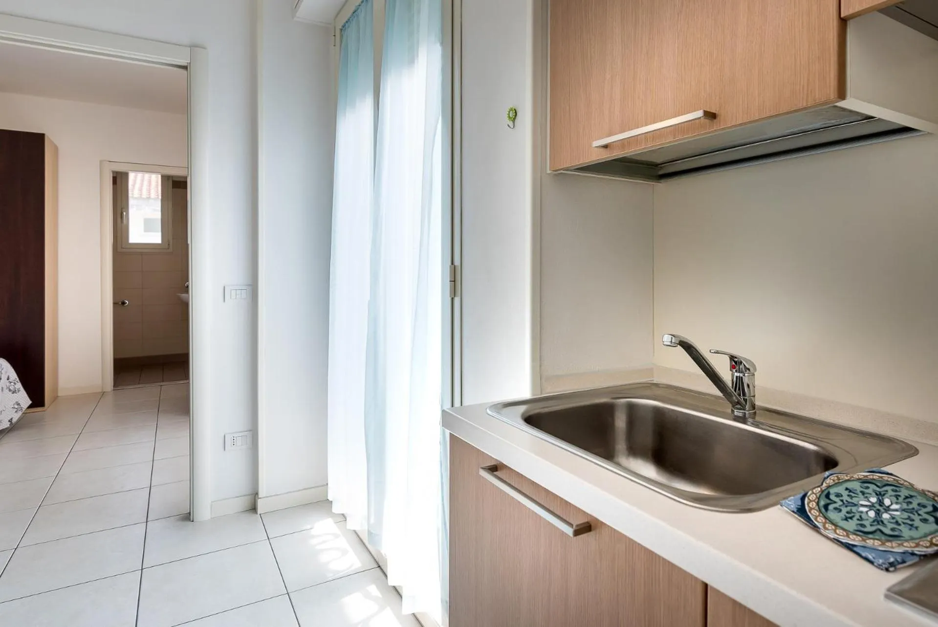 Kitchen or kitchenette in Residence Acqua Suite Marina