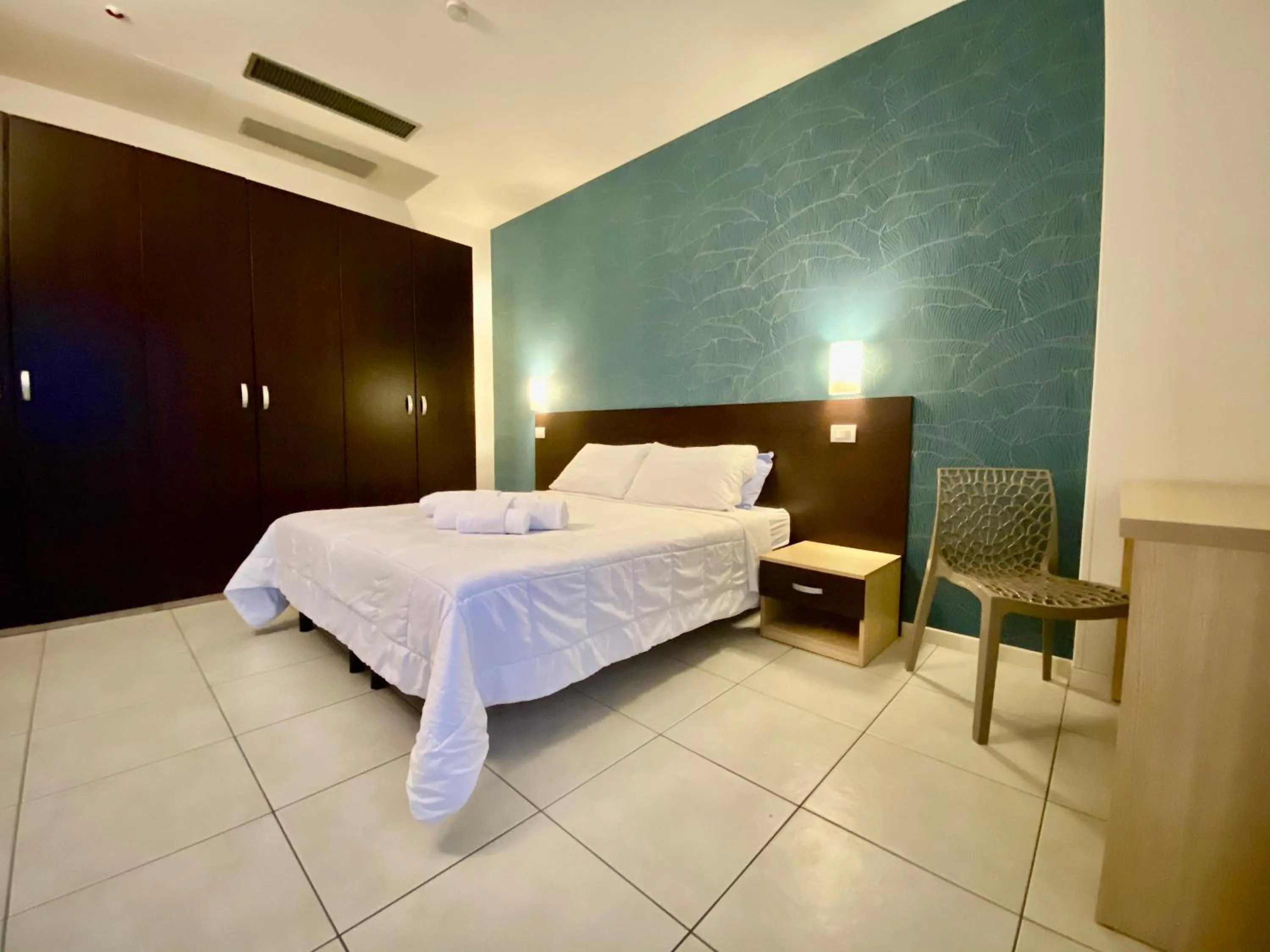 Photo of the whole room, Bed in Residence Acqua Suite Marina