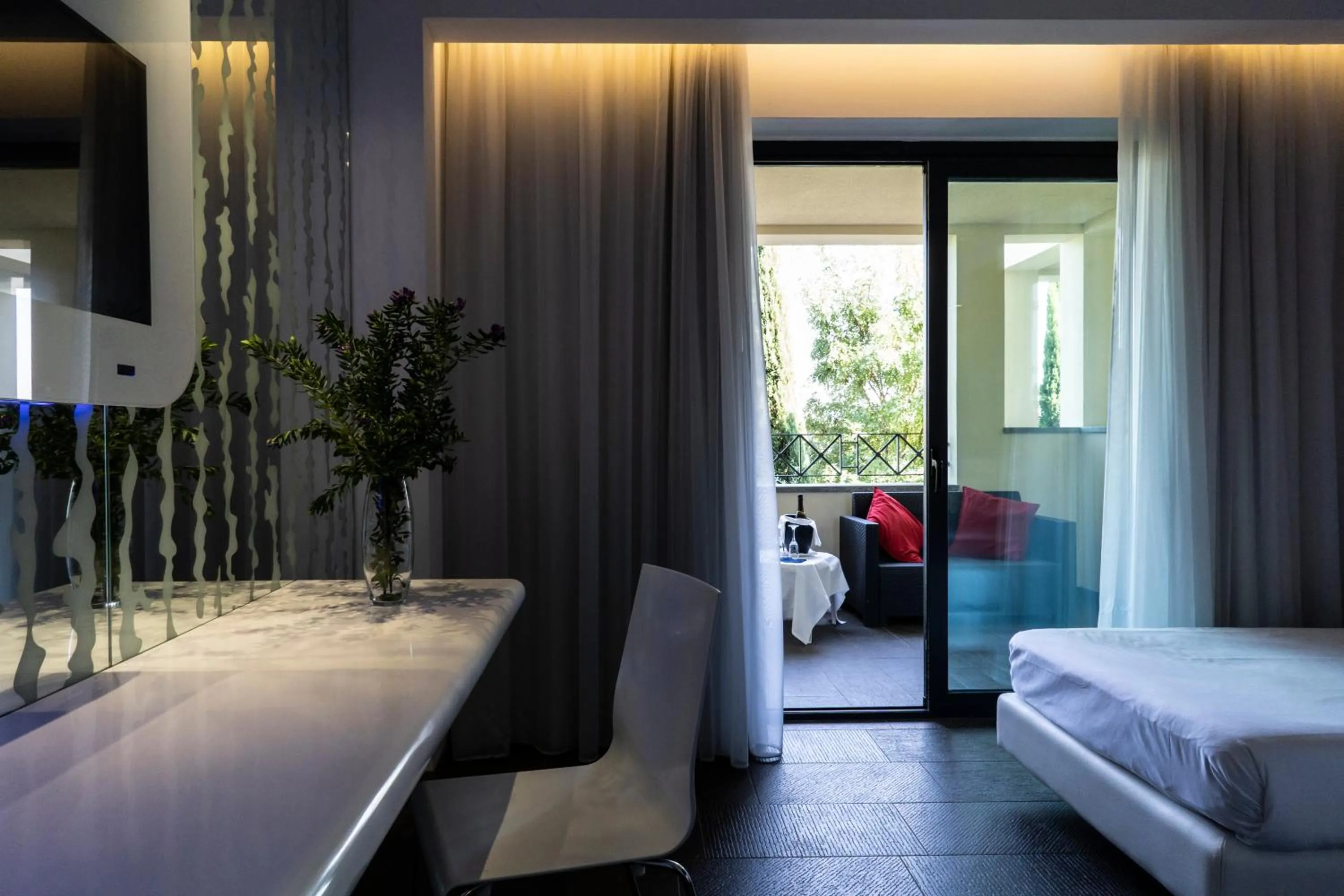 Balcony/Terrace, Bed in A Point Porto Ercole Resort & Spa