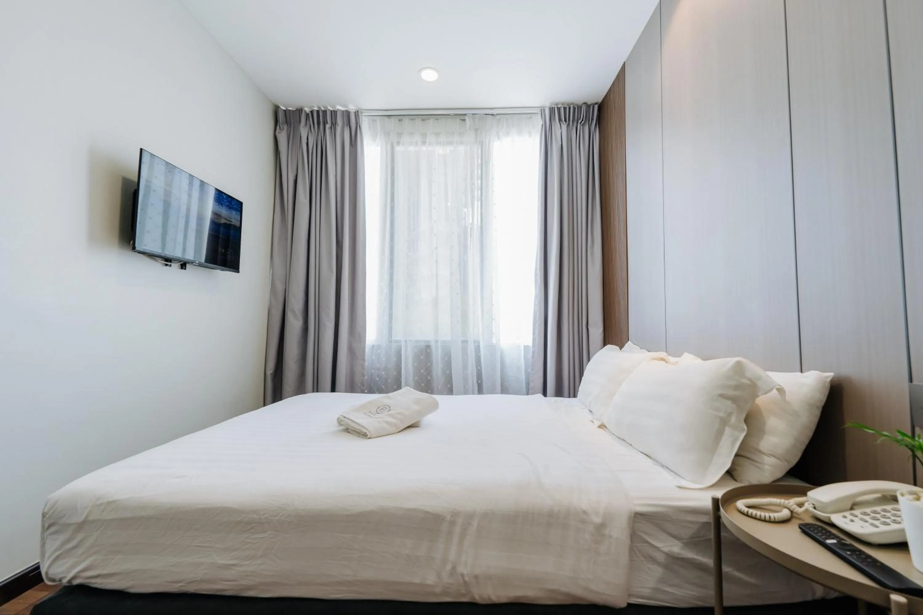 Bed in Wangs Hotel Gurney Drive