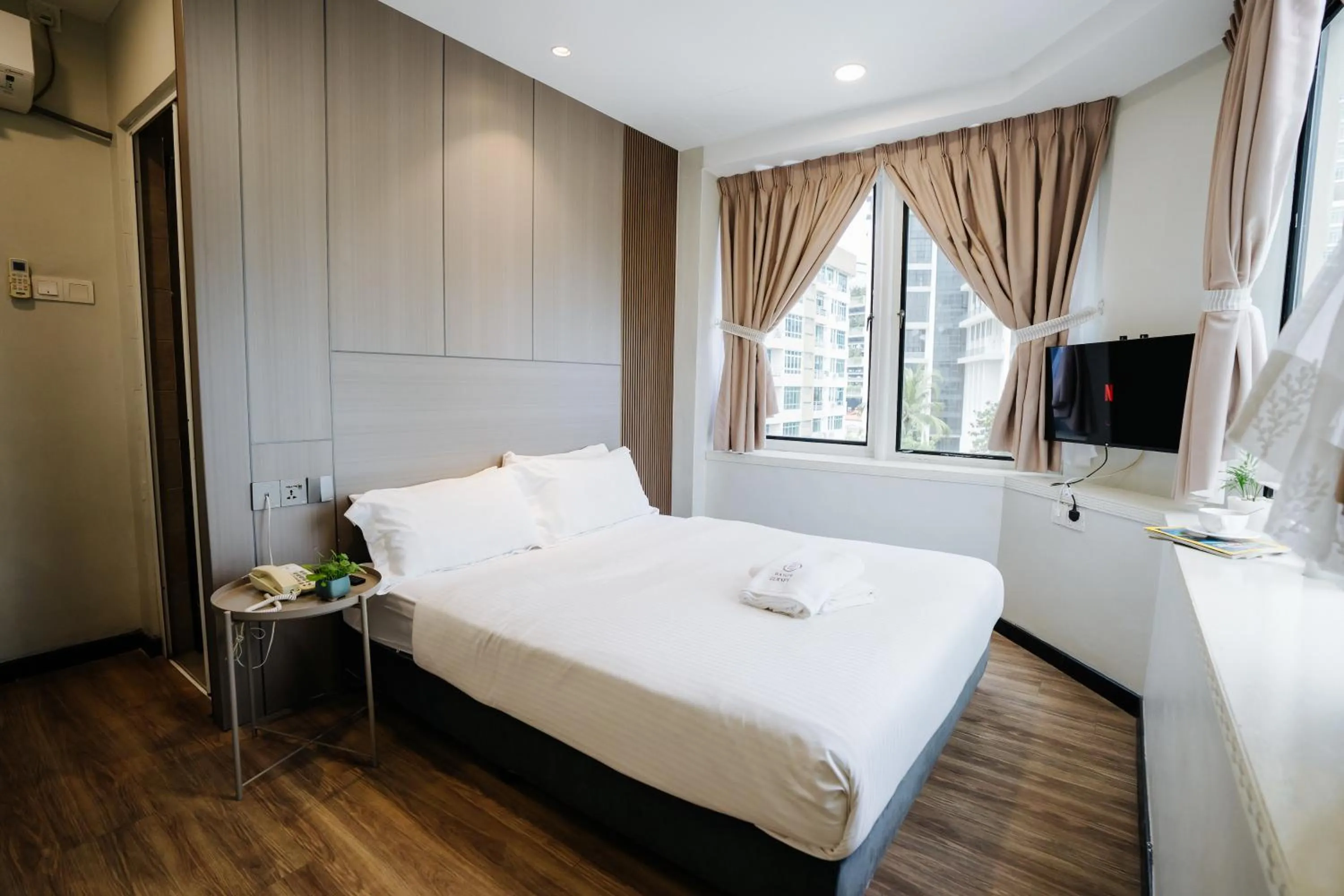 Bed in Wangs Hotel Gurney Drive