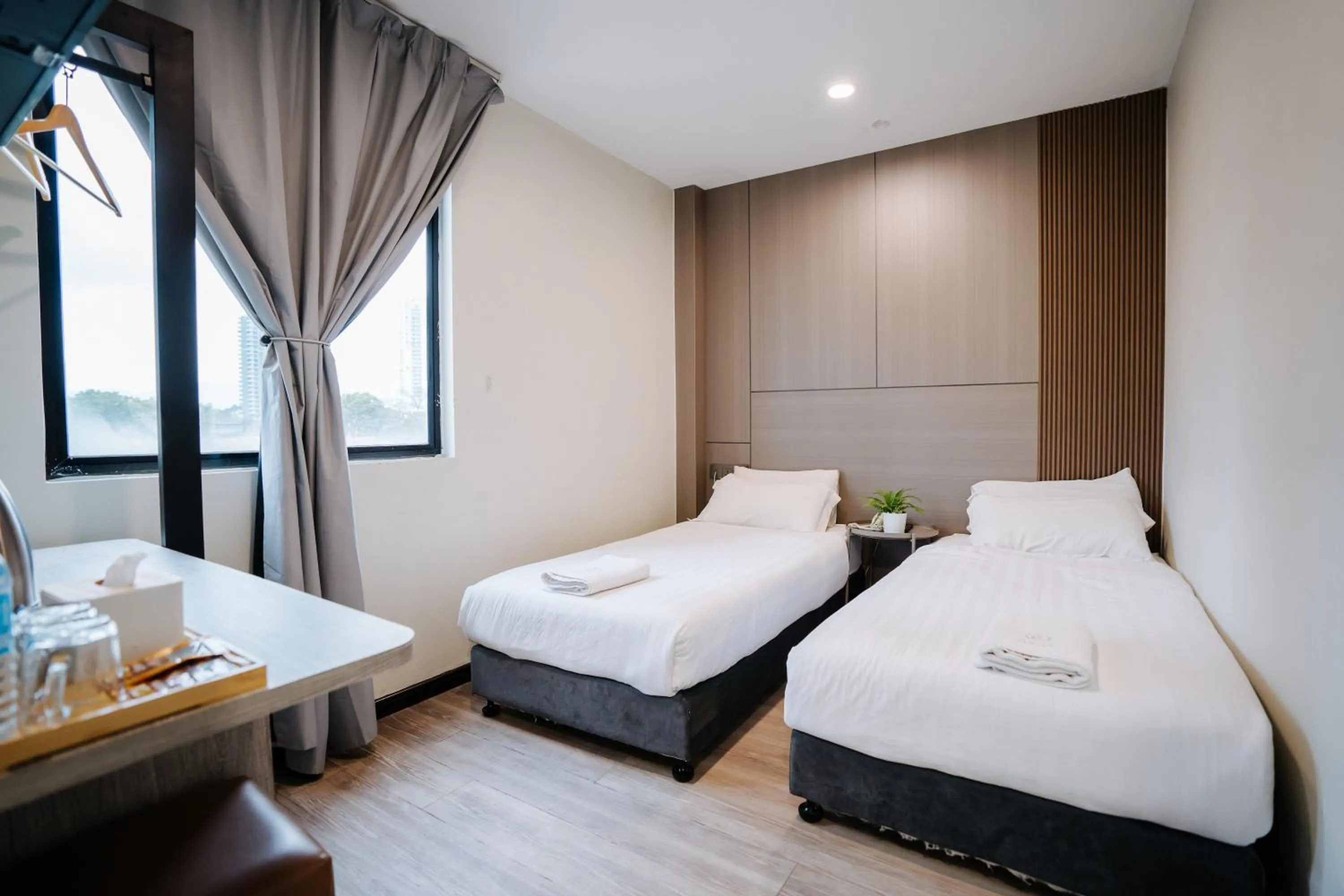 Bed in Wangs Hotel Gurney Drive