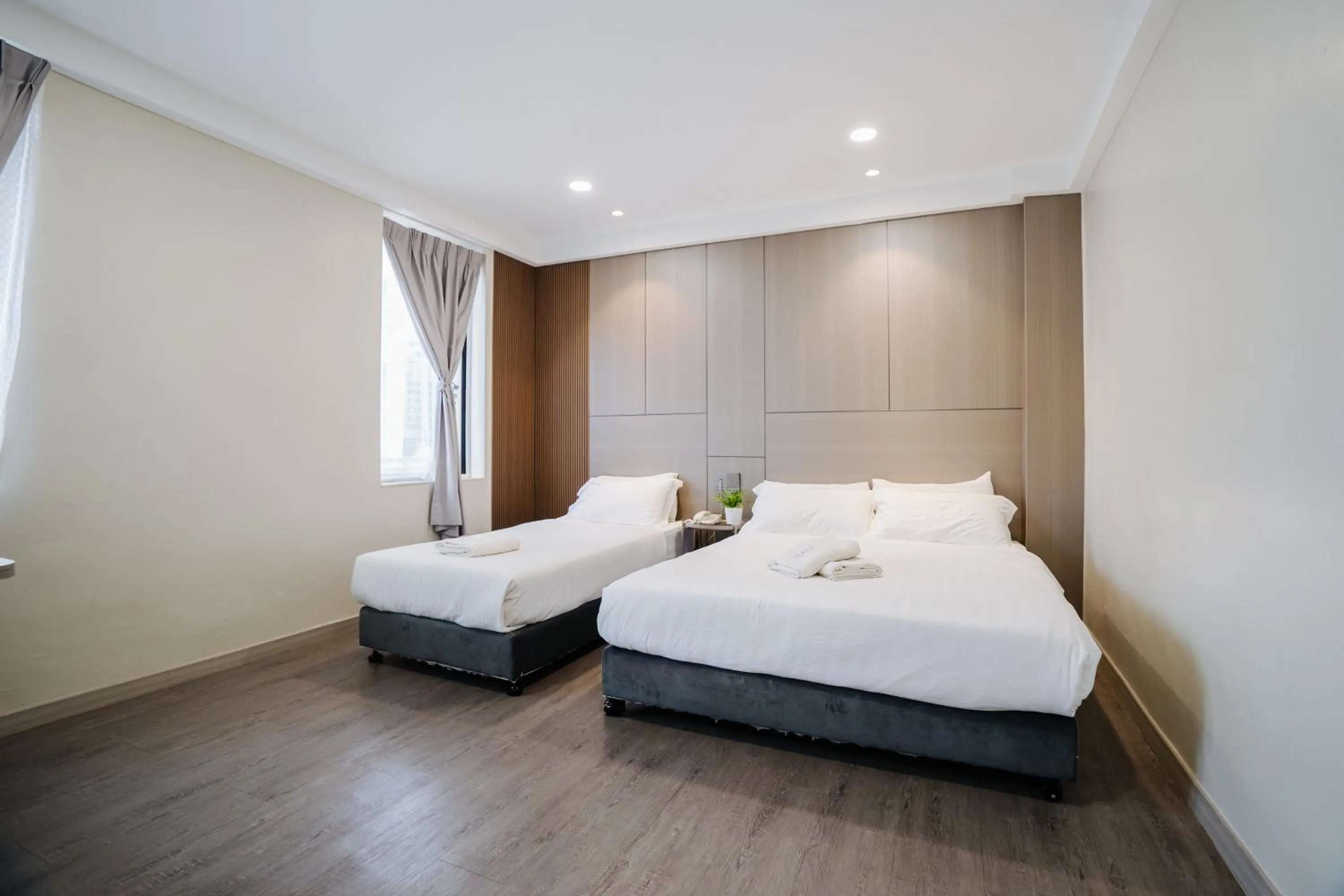 Bed in Wangs Hotel Gurney Drive