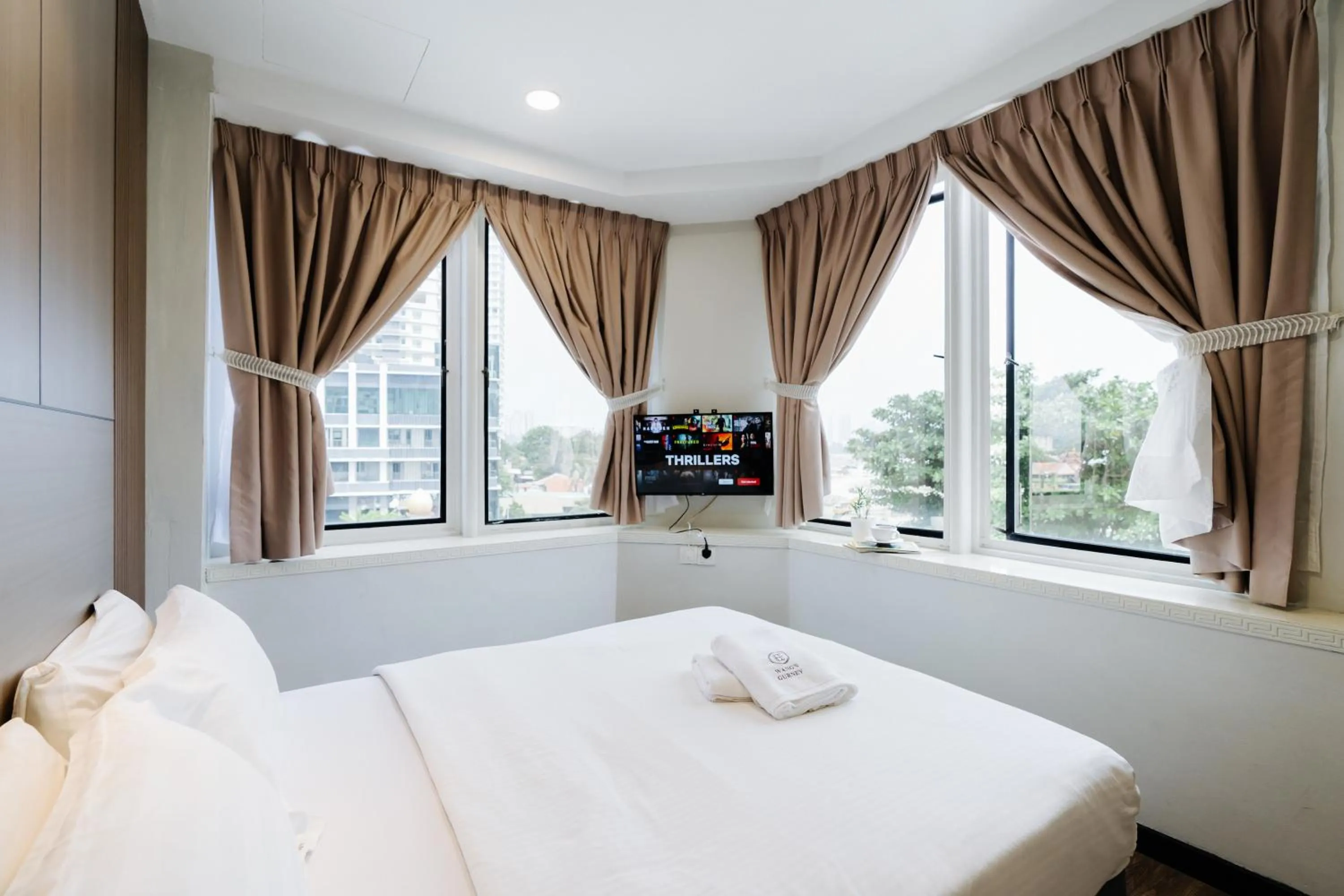 Bed in Wangs Hotel Gurney Drive