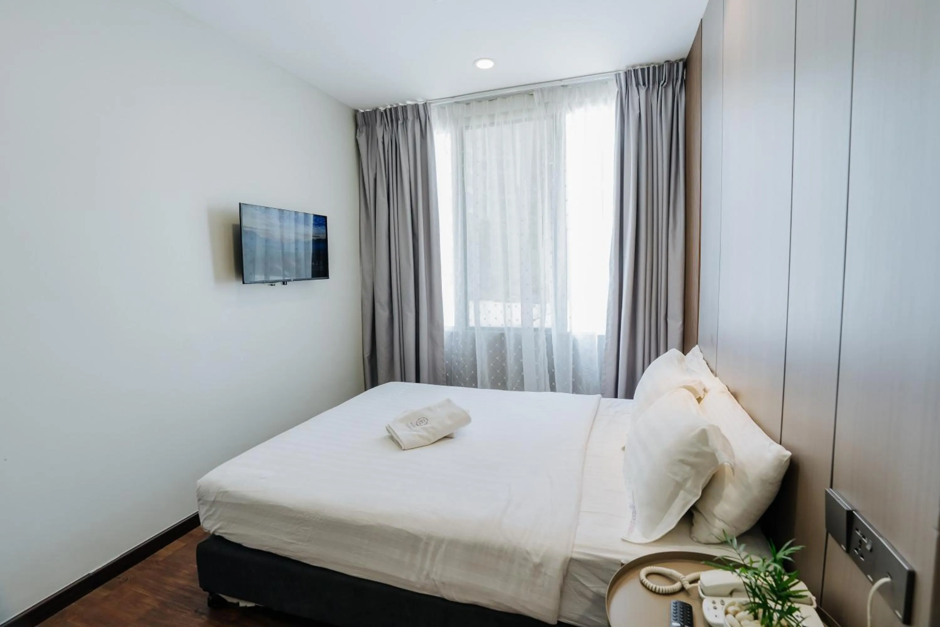 Bed in Wangs Hotel Gurney Drive