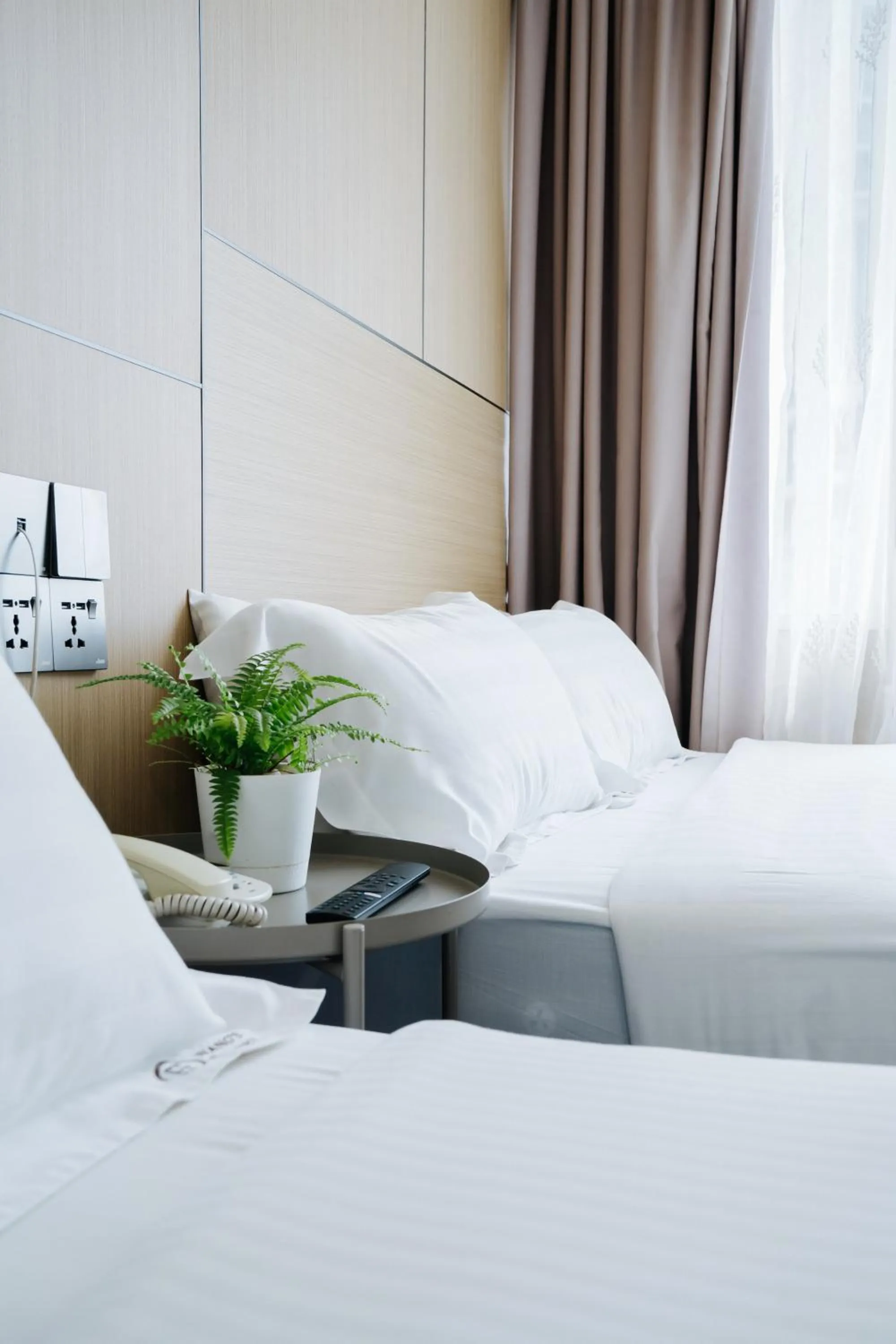 Bed in Wangs Hotel Gurney Drive